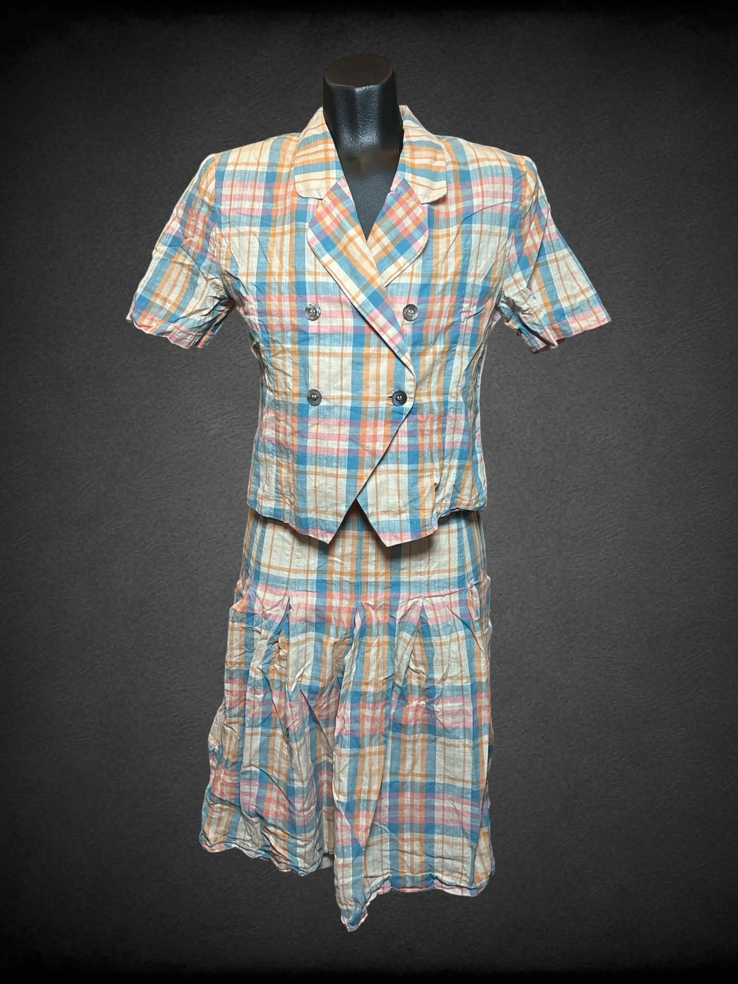 XS Superfay two-piece top & skirt set with orange, pink & blue plaid pattern