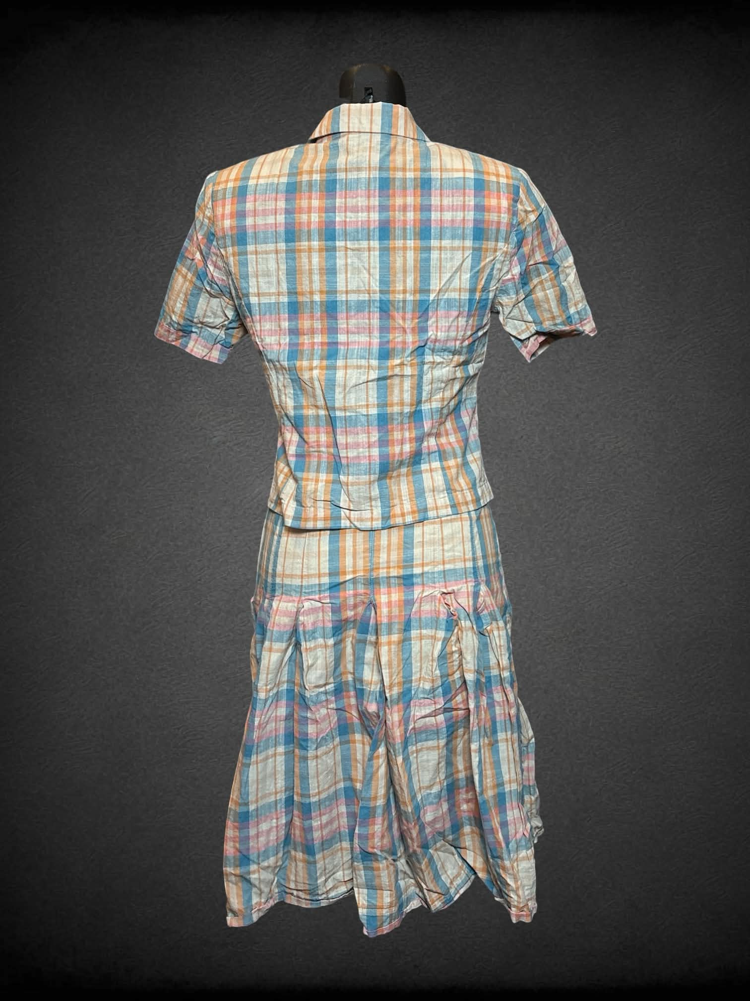 XS Superfay two-piece top & skirt set with orange, pink & blue plaid pattern