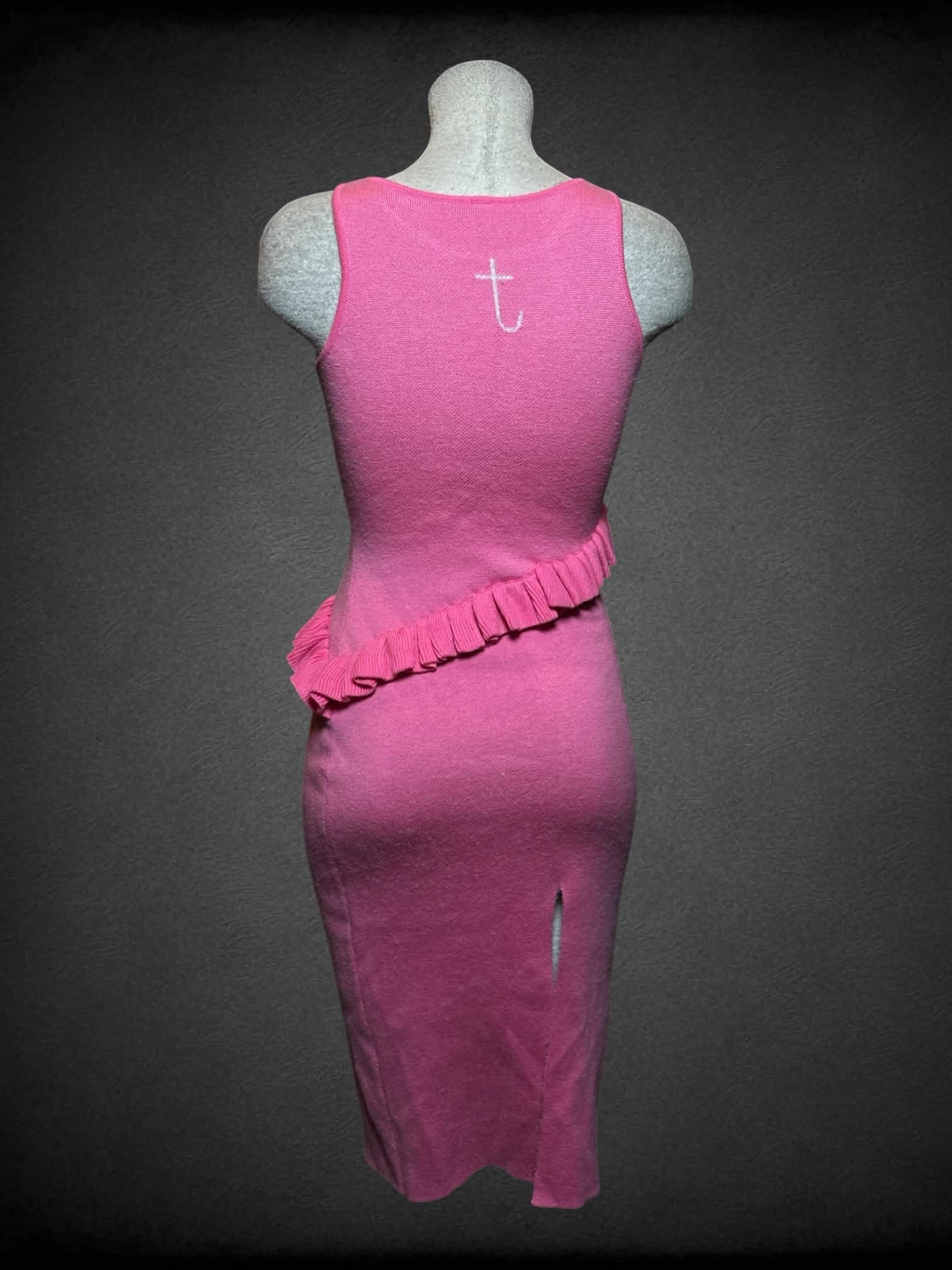 L Tattletale pink soft dress with asymmetrical ruffle hem, white bunny graphic on front, and slit on skirt