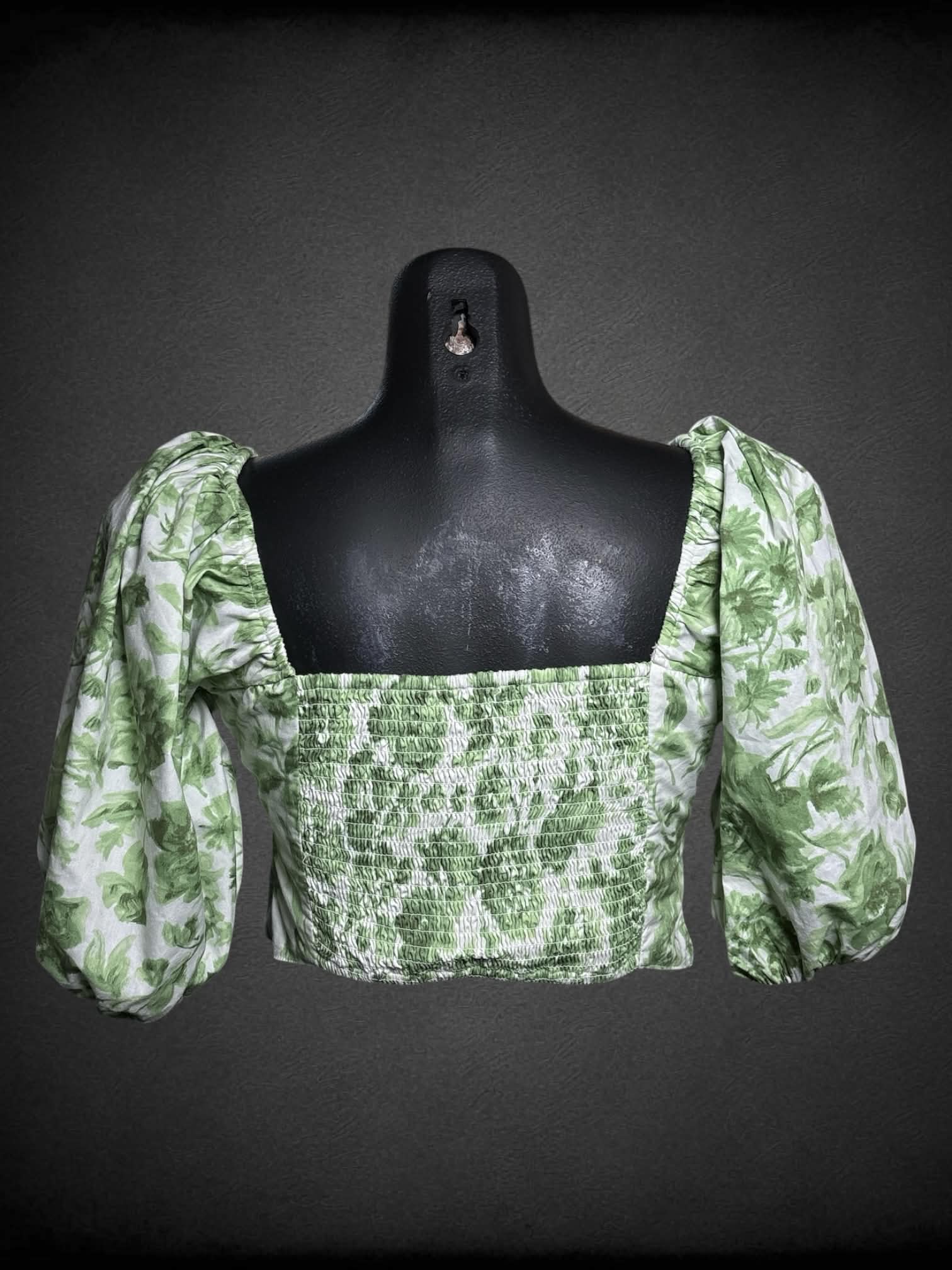 M Abercrombie & Fitch white crop top with green floral pattern, shirred back, and puff sleeves