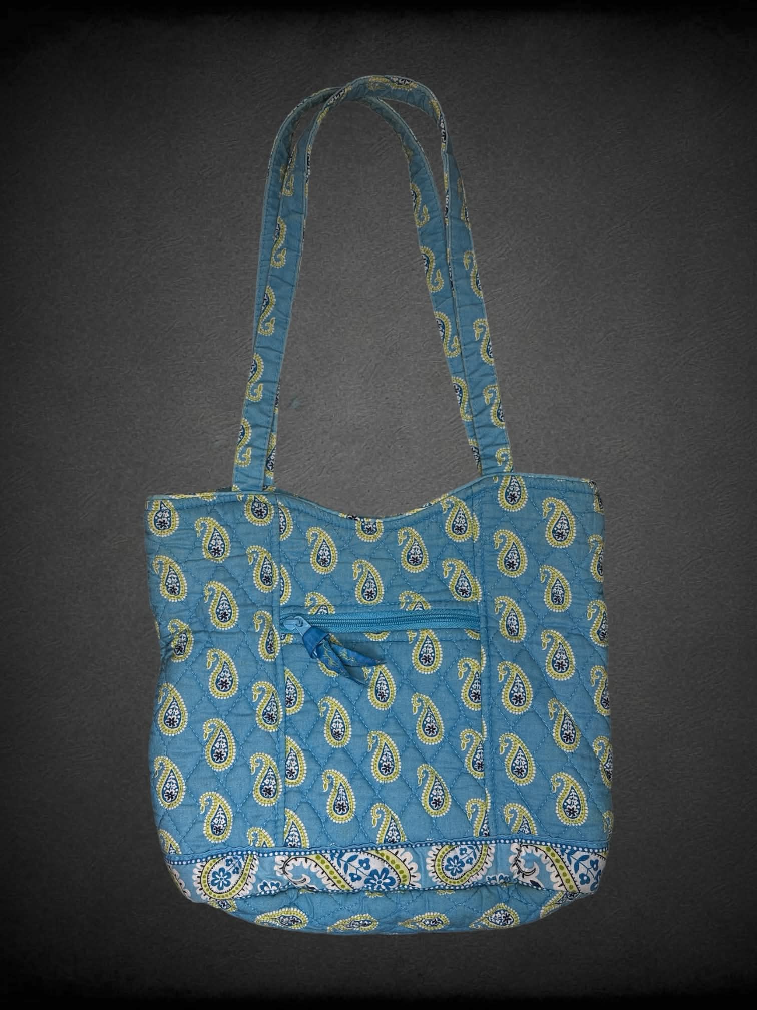 Vera Bradley blue cloth shoulder bag with green paisley design, and zipper pocket on front