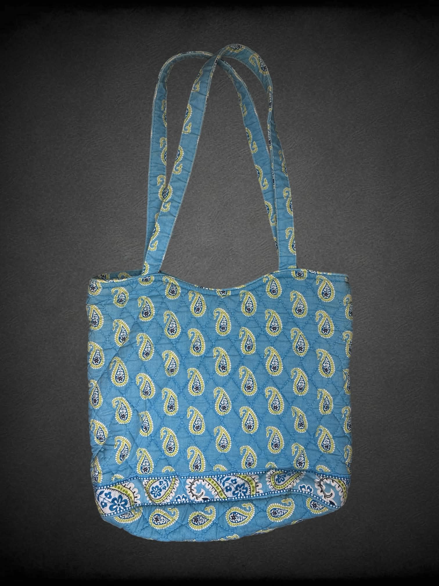 Vera Bradley blue cloth shoulder bag with green paisley design, and zipper pocket on front