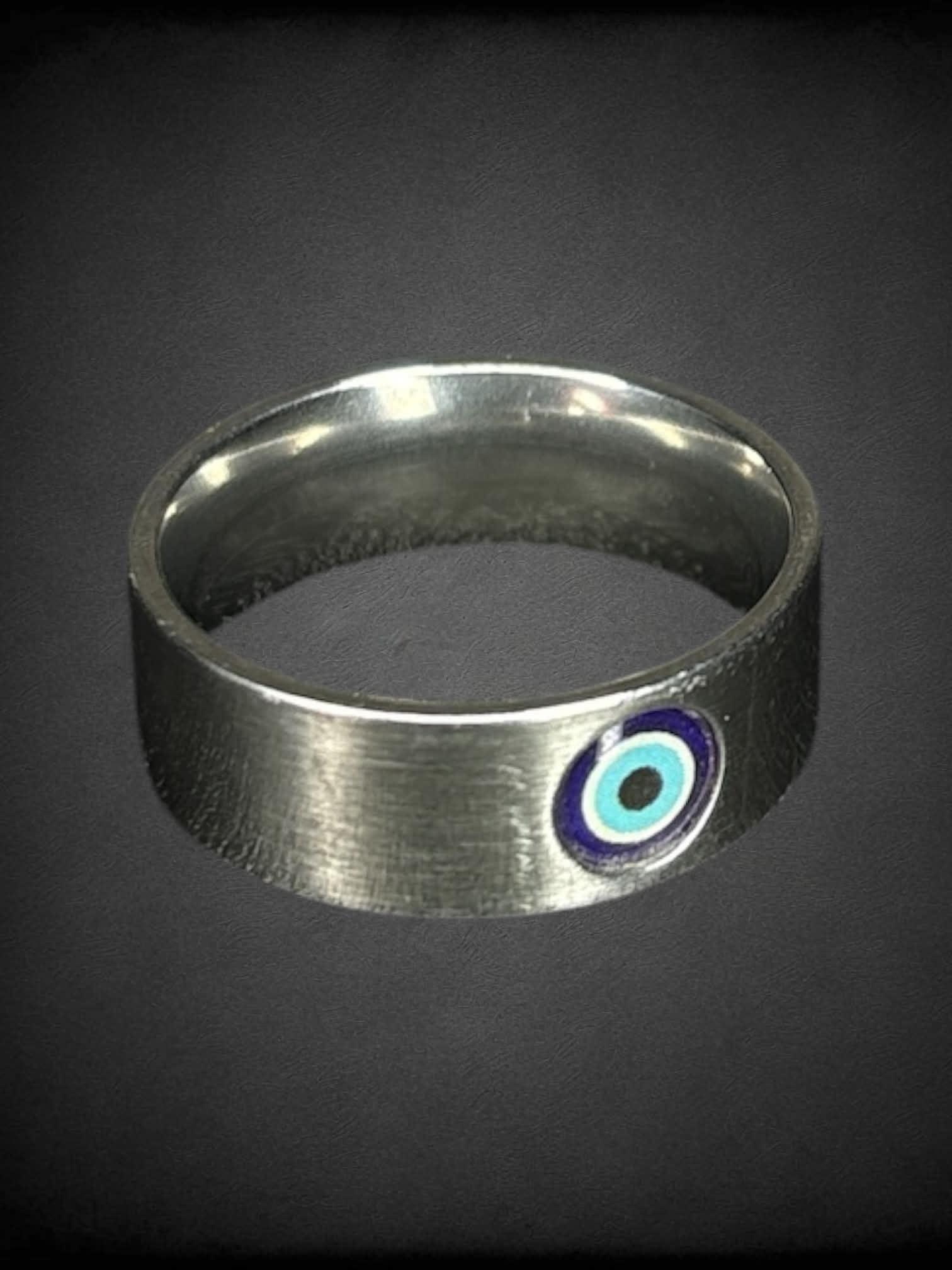 Size 10 silver ring with evil eye on front