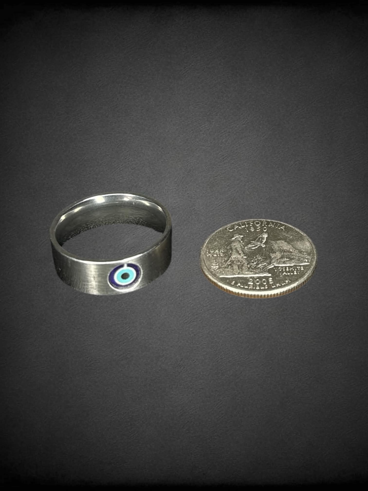 Size 10 silver ring with evil eye on front