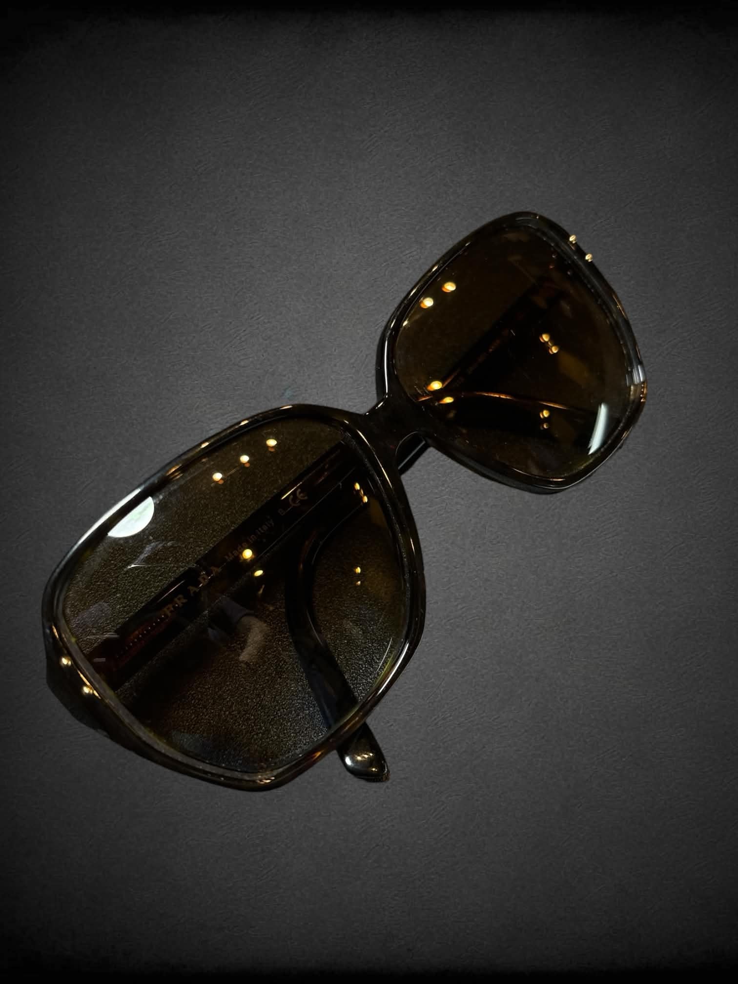 Prada SPR 16M sunglasses with polarized brown gradient lenses and Havana tortoiseshell frames