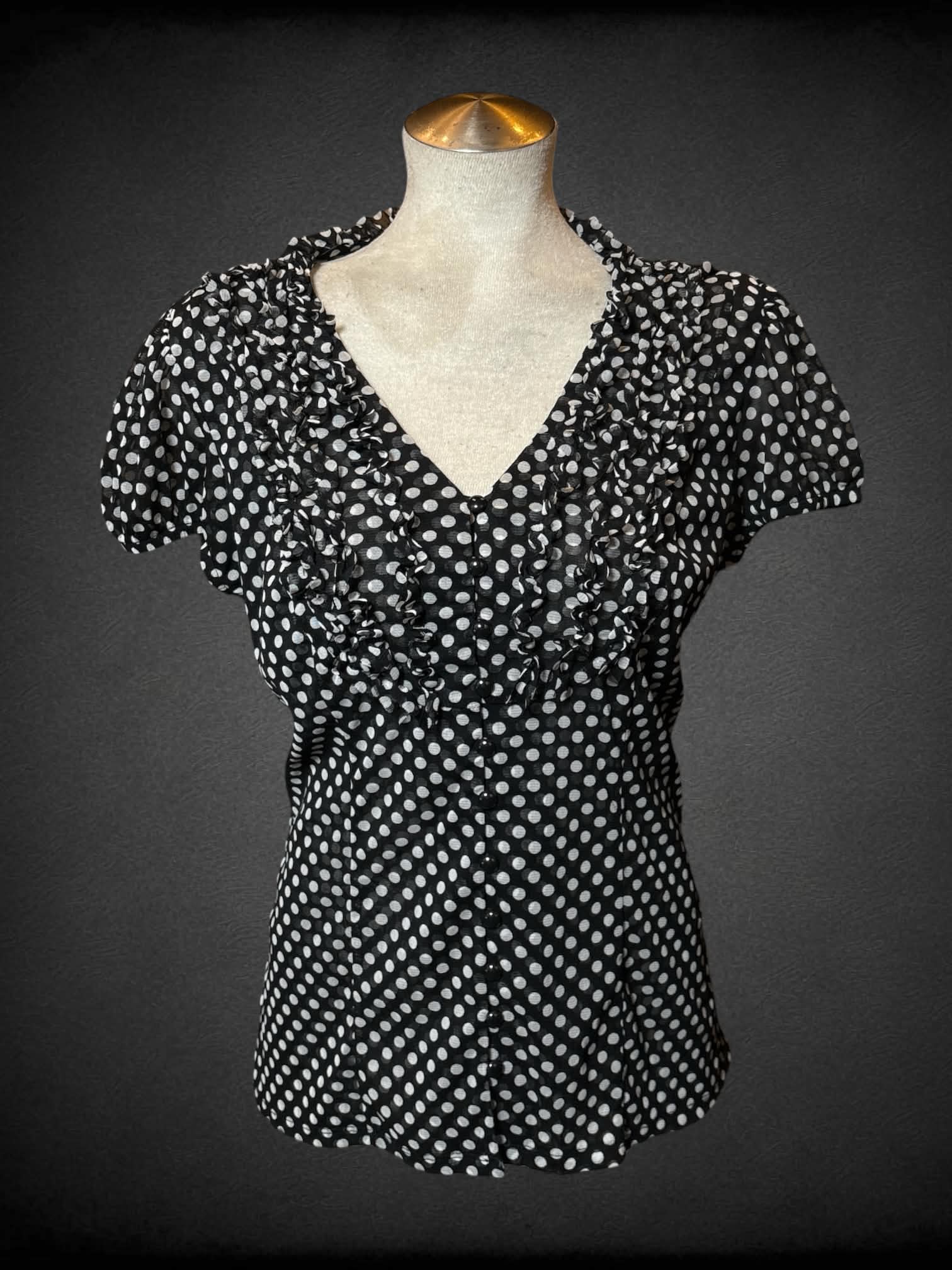 L International Concepts black sheer button-up blouse with white polka dot pattern, and ruffles on front