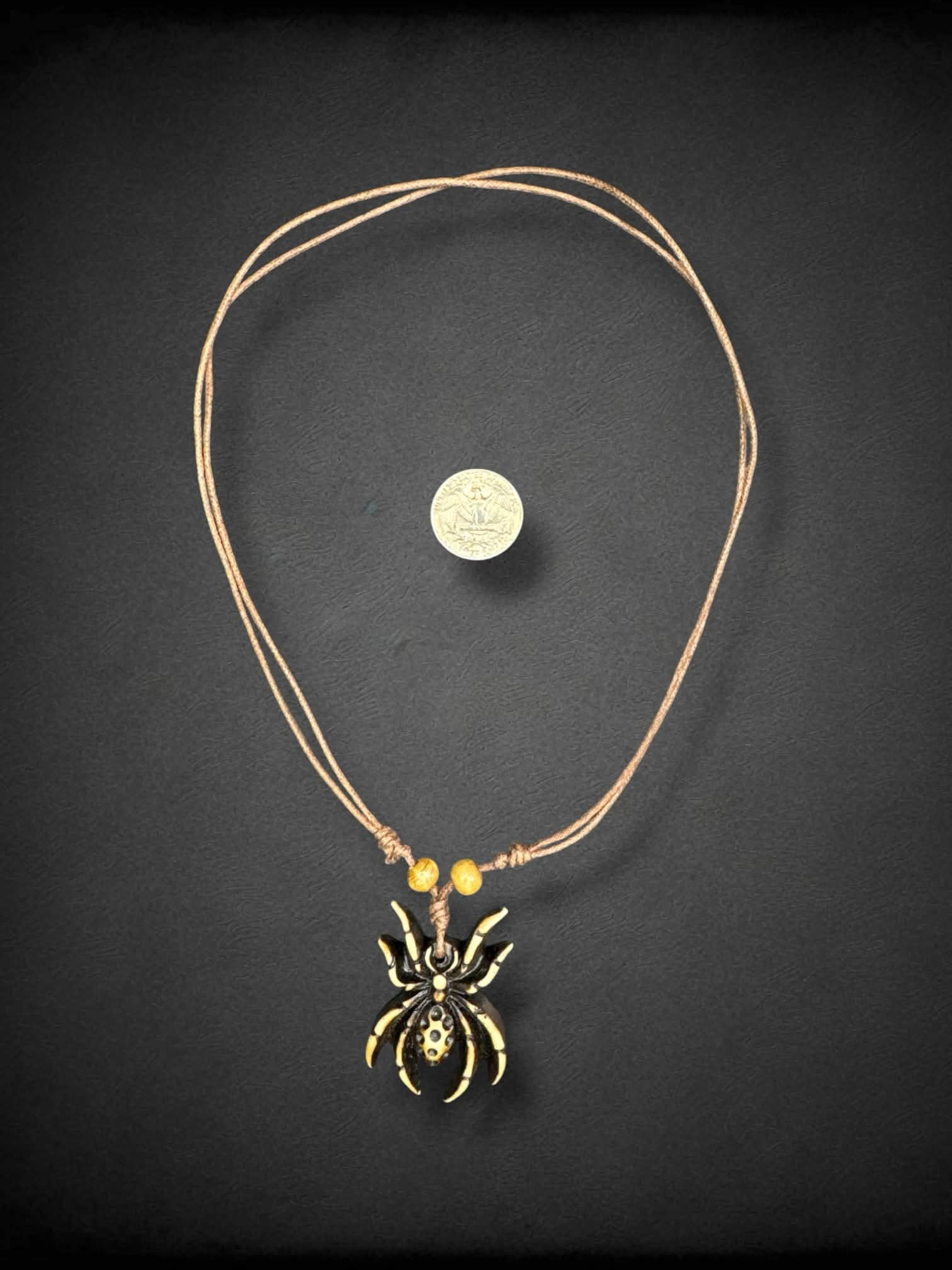 Brown twine adjustable necklace with aged spider pendant