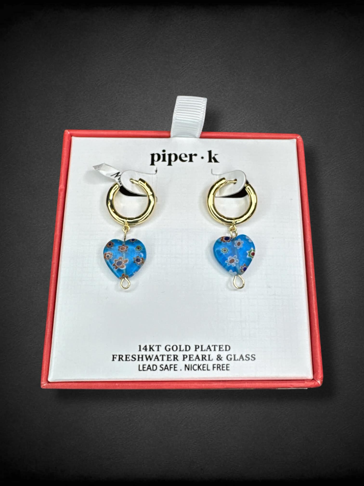 Piper K 14kt gold plated earrings with freshwater pearl and glass pendants, and snap closures