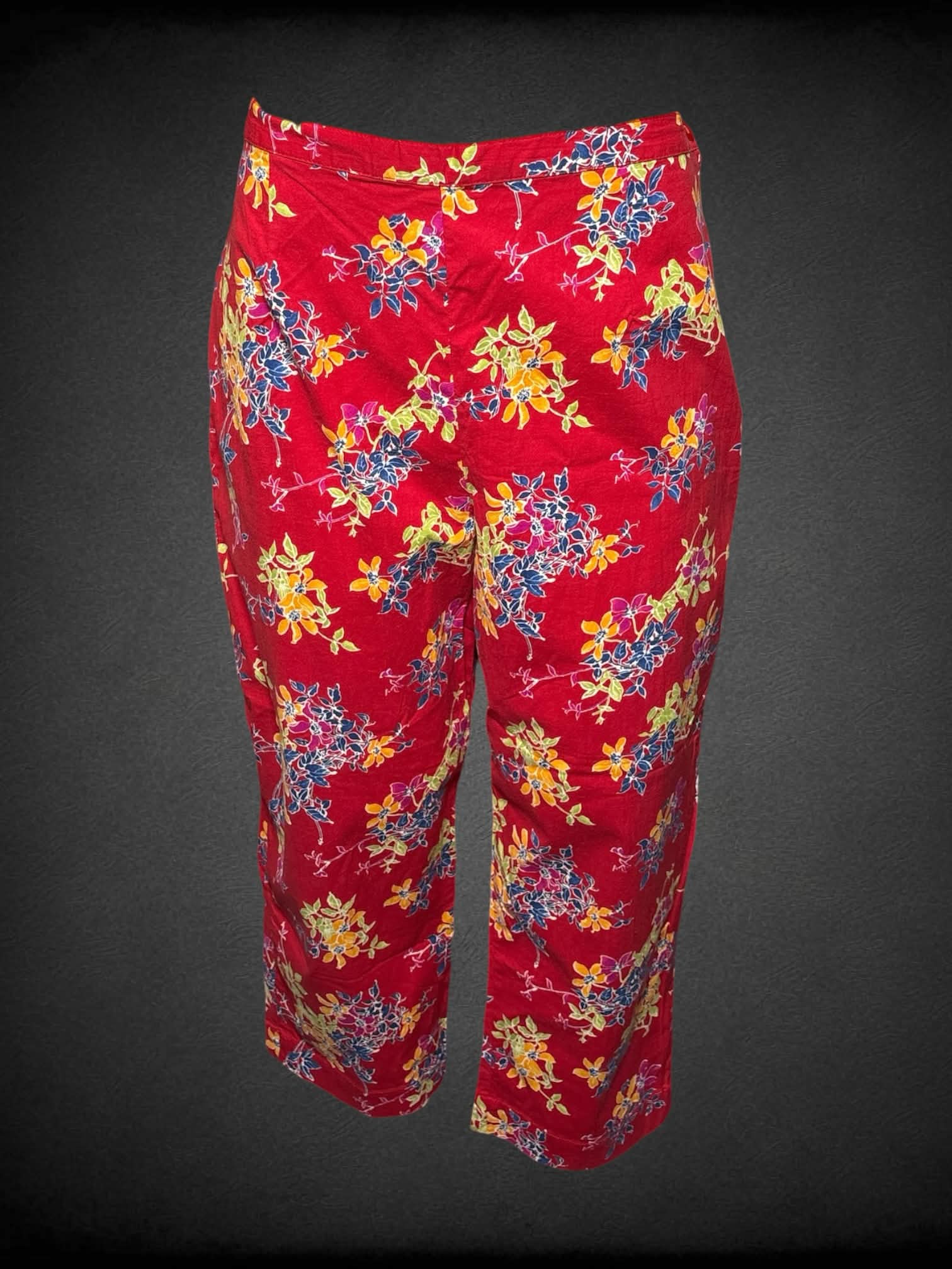 L Studio Ease vintage red pants with yellow, green & blue floral pattern, and zipper on side