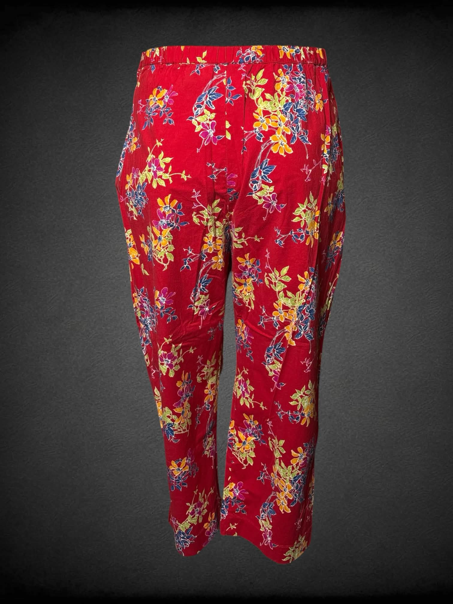 L Studio Ease vintage red pants with yellow, green & blue floral pattern, and zipper on side