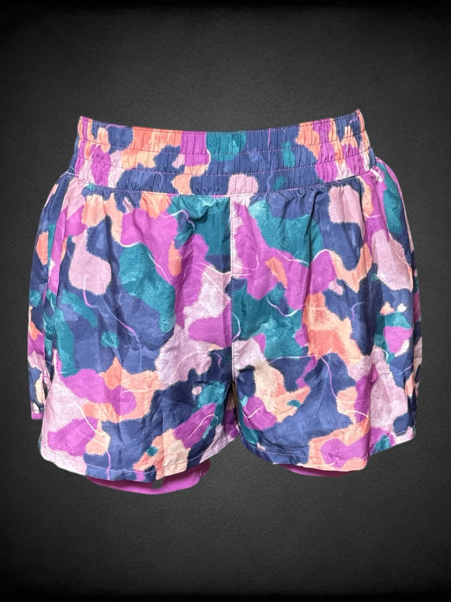 XL Reebok purple shorts with blue & orange abstract pattern, and stretch waist
