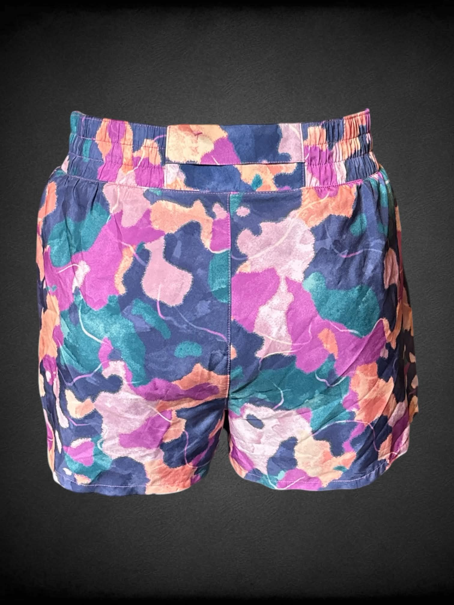 XL Reebok purple shorts with blue & orange abstract pattern, and stretch waist