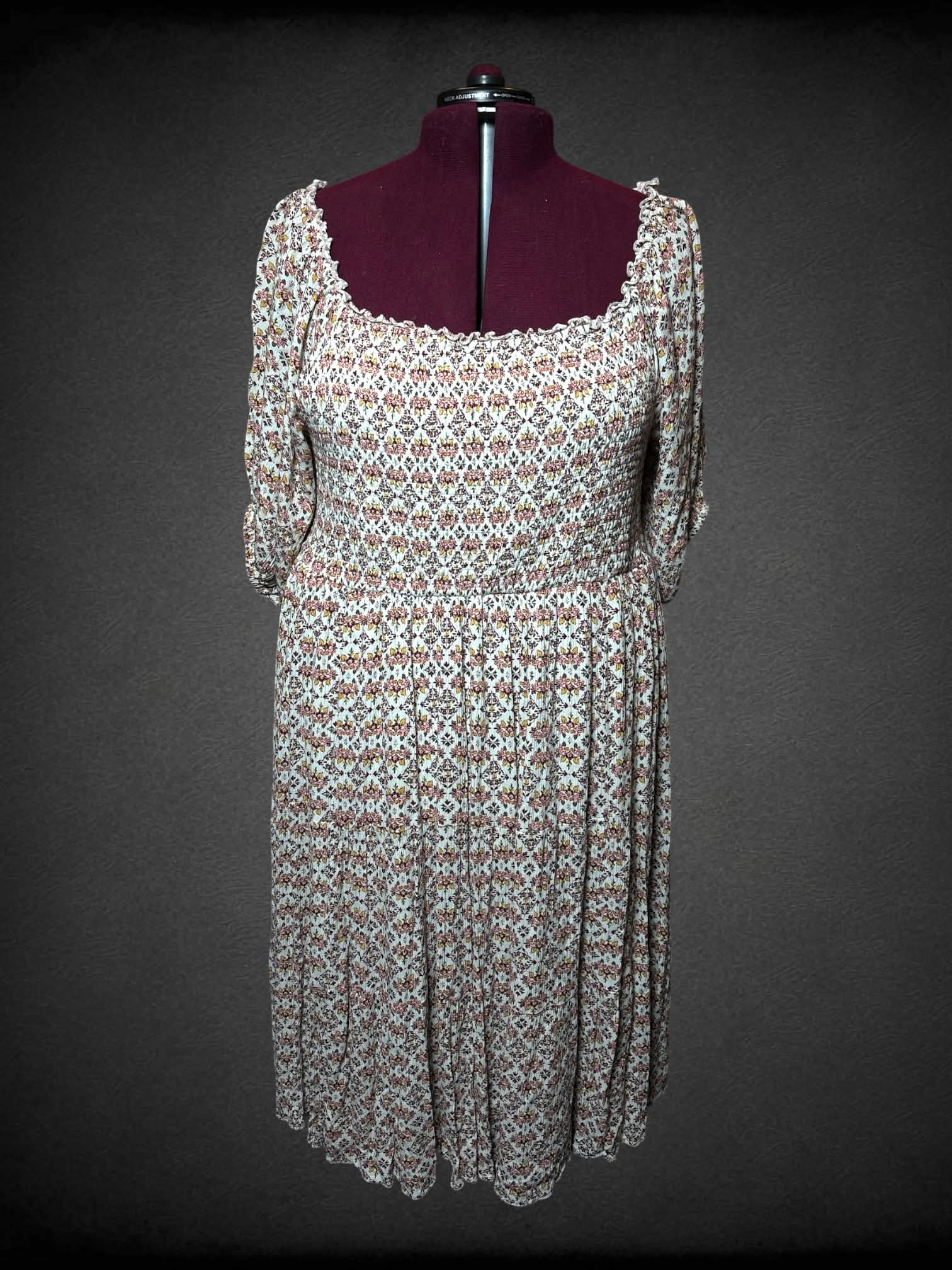4X Torrid off-white sundress with pink floral pattern, and shirred top