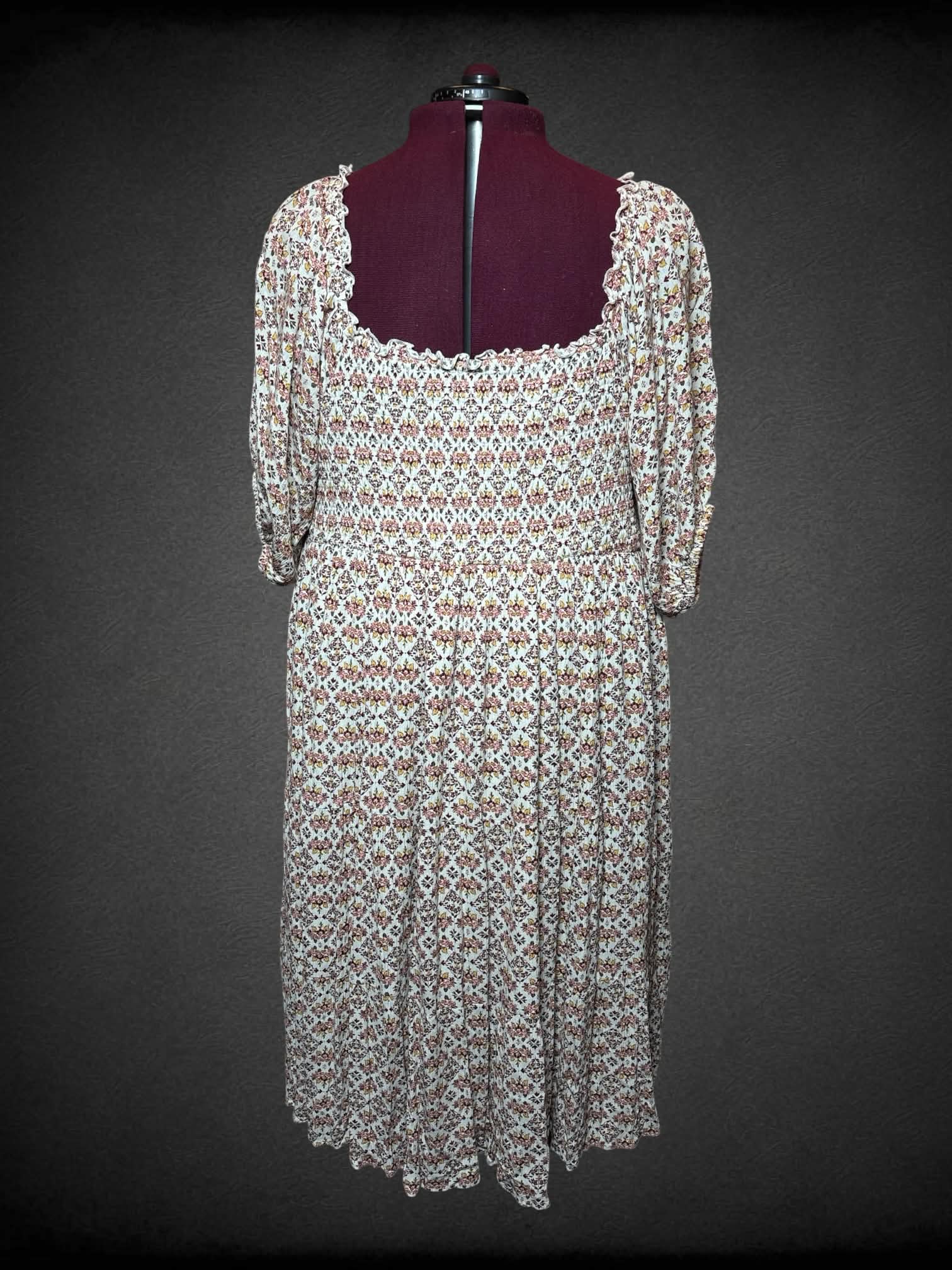 4X Torrid off-white sundress with pink floral pattern, and shirred top