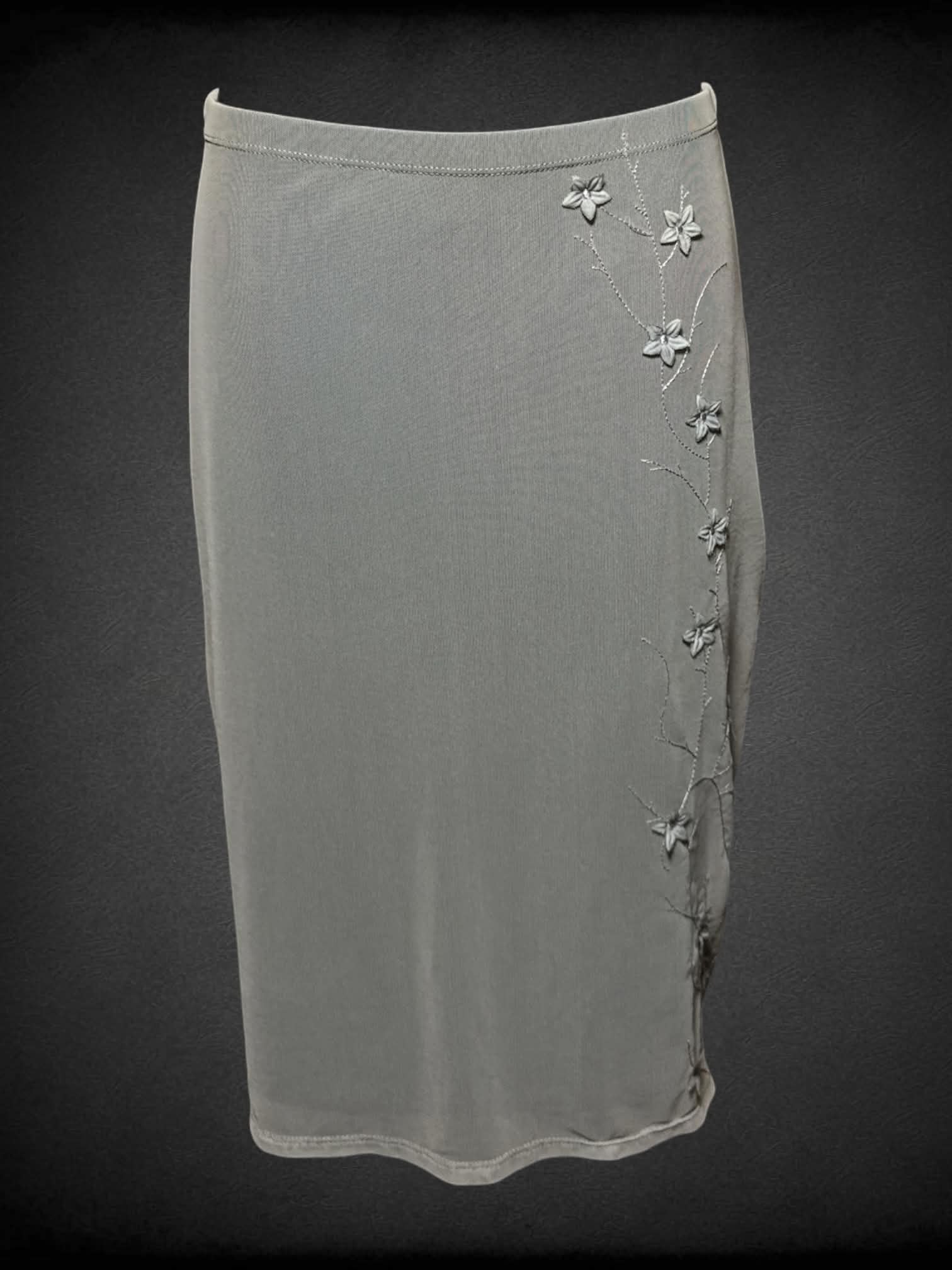 M Express vintage grey mesh skirt with sewn flowers alongside front