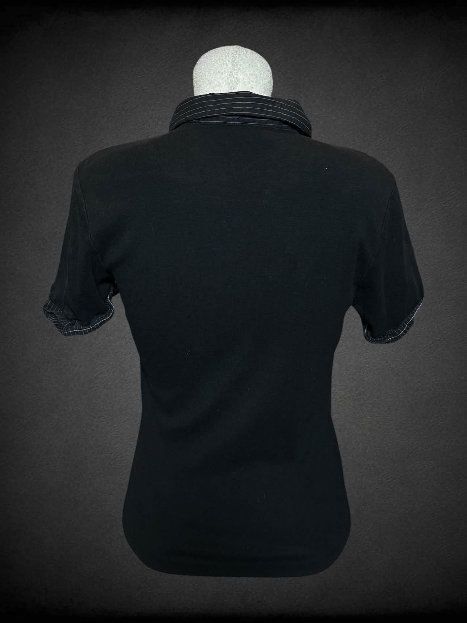 L Morbid Threads vintage black polo shirt with striped collar and cuffed sleeves, and sewn heart with lightnight bolt graphic on front