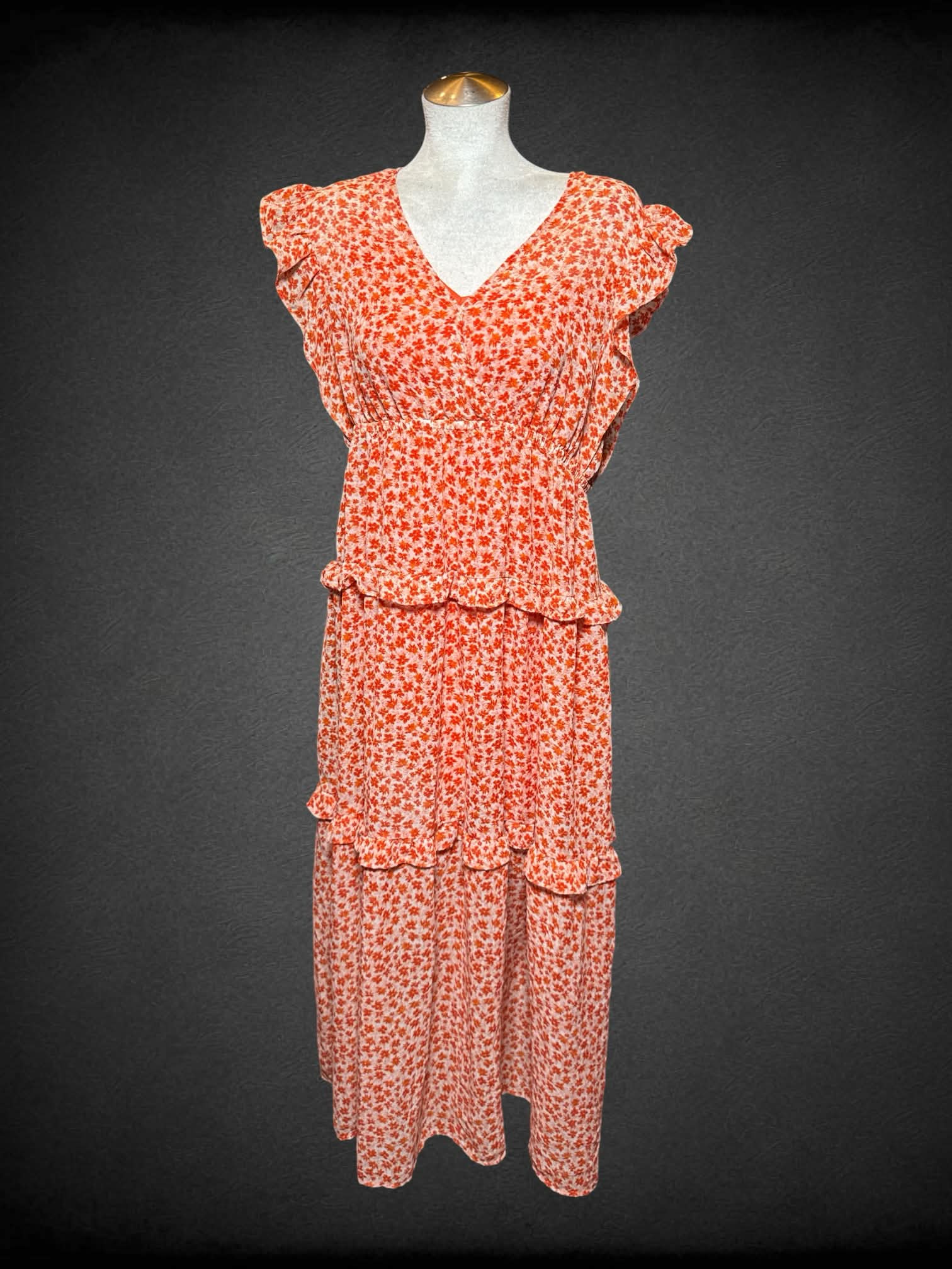 L Cato orange sundress with floral pattern, and sheer outer layer