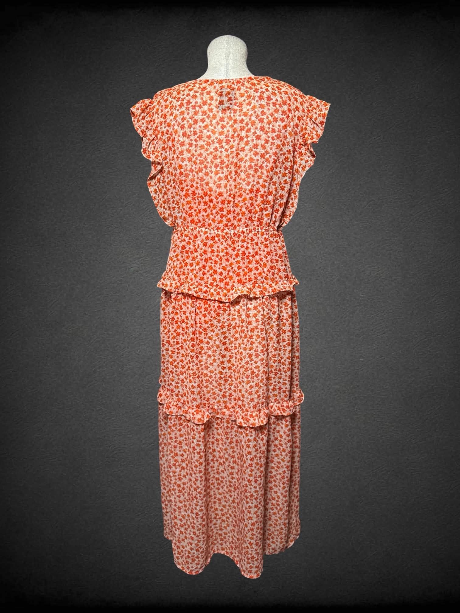 L Cato orange sundress with floral pattern, and sheer outer layer