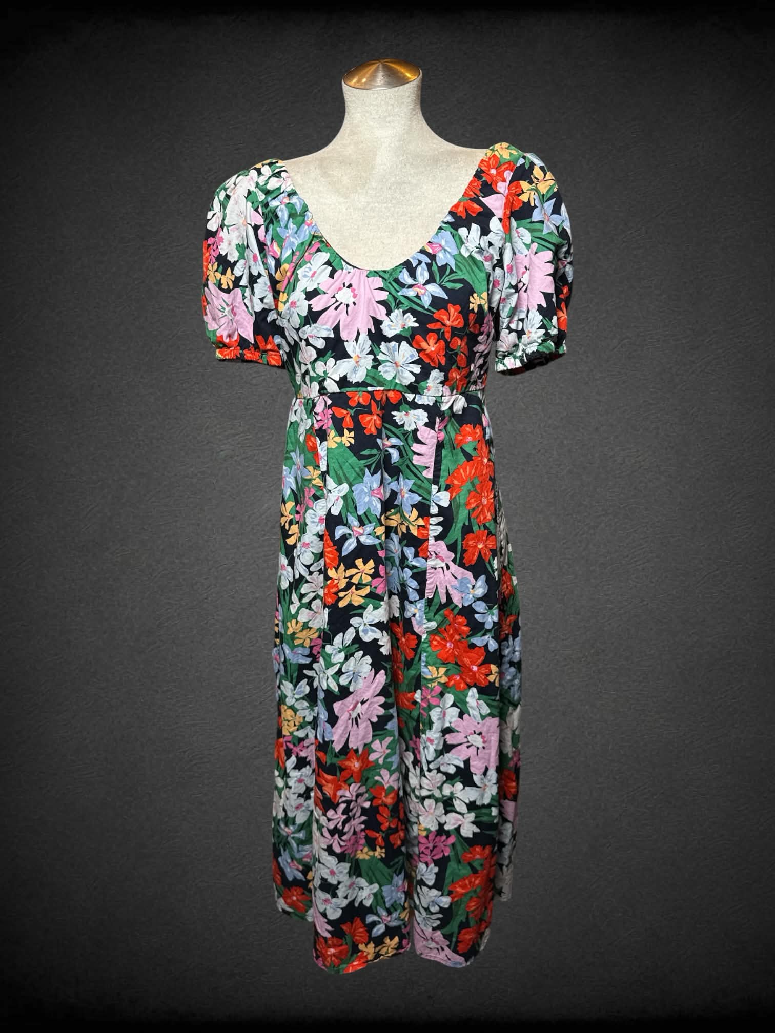 L Old Navy blue sundress with colorful floral pattern, pockets and shirred back