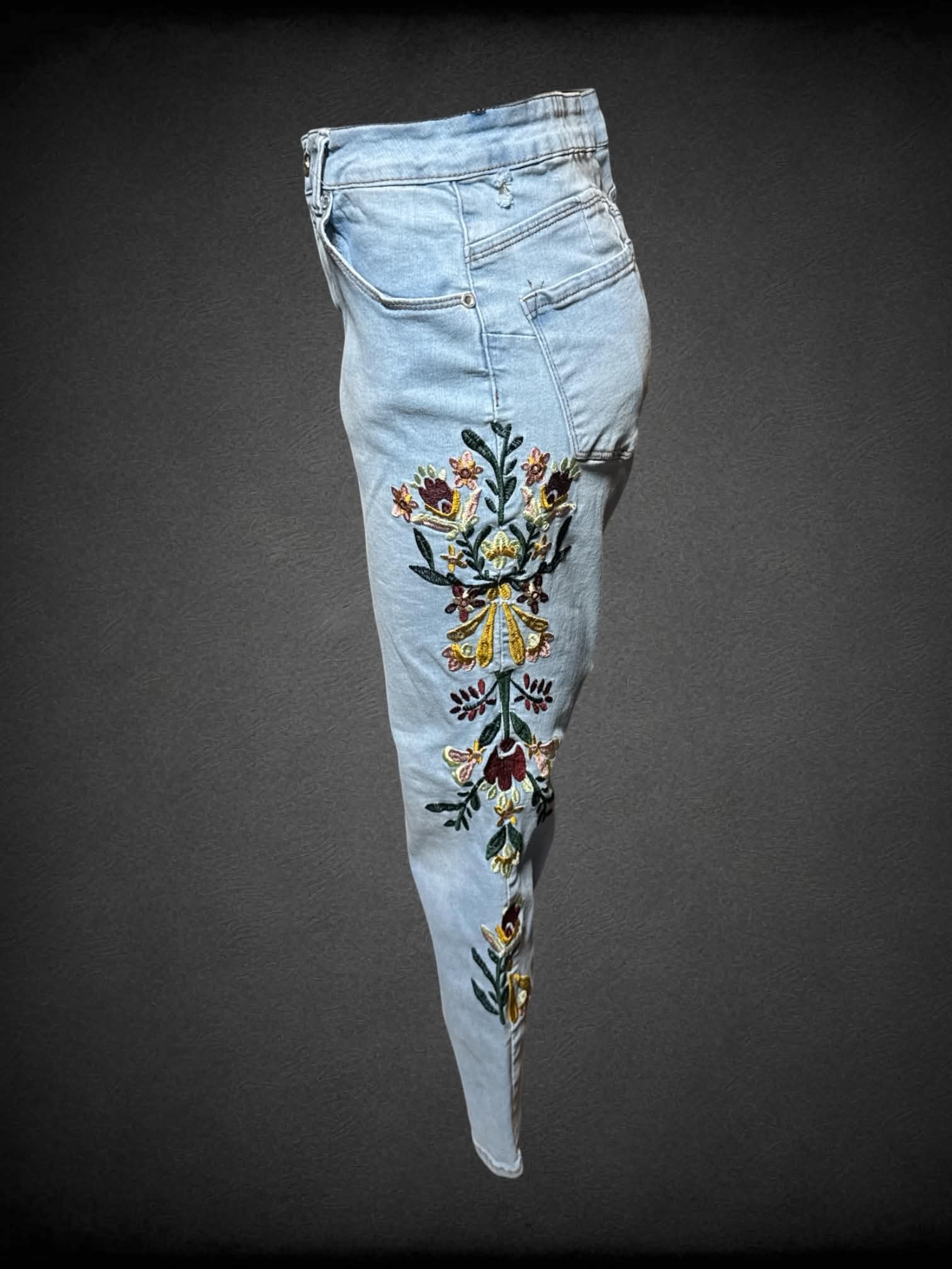 L Sandpiper blue skinny jeans with embroidered flowers on each side