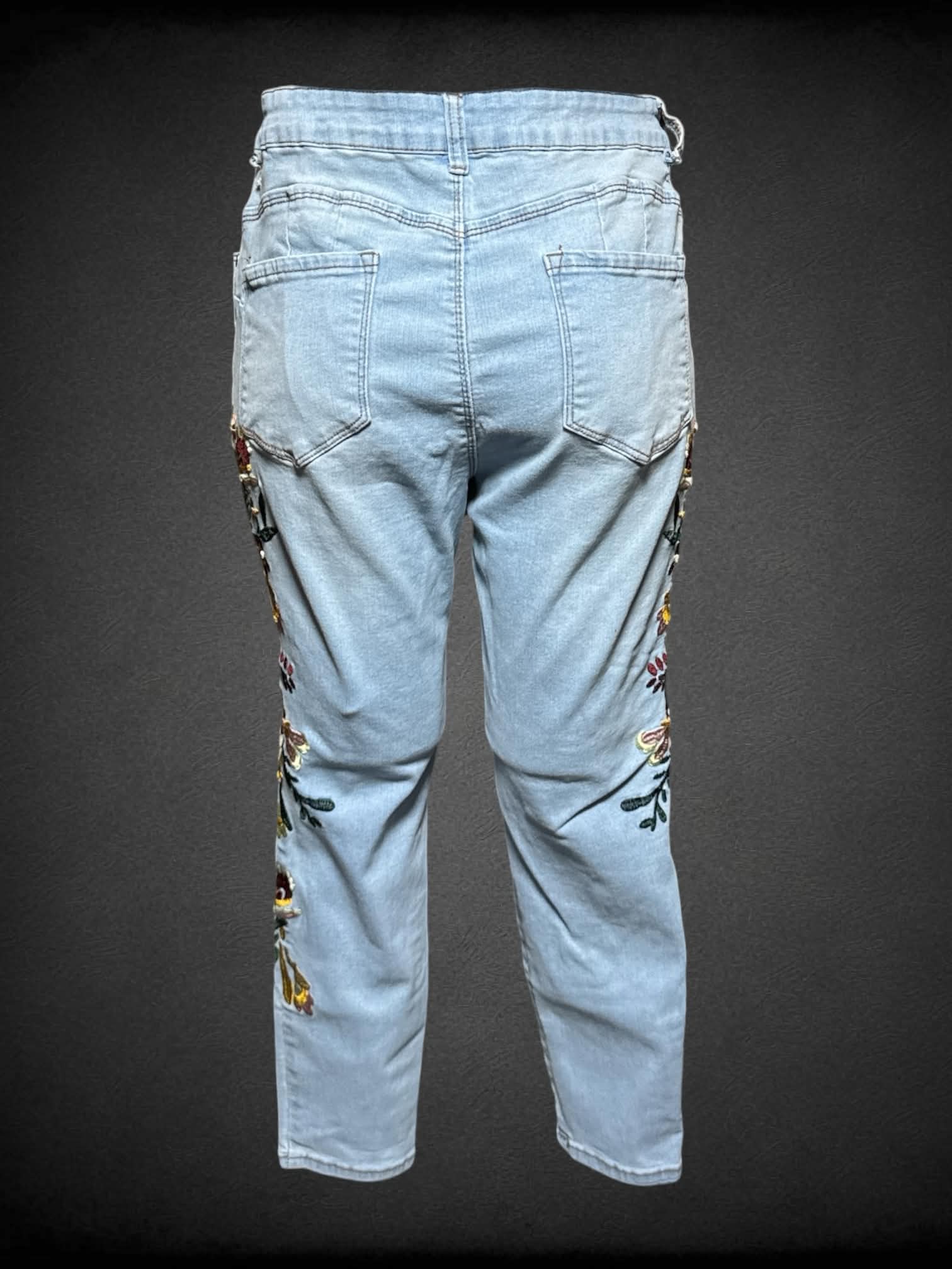 L Sandpiper blue skinny jeans with embroidered flowers on each side