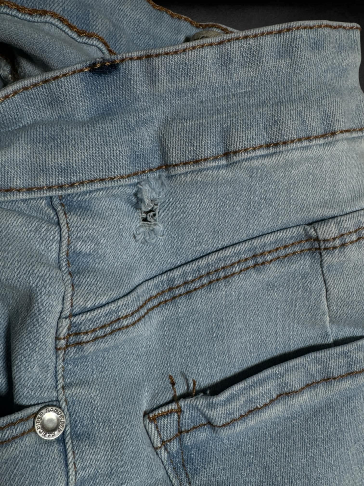 L Sandpiper blue skinny jeans with embroidered flowers on each side