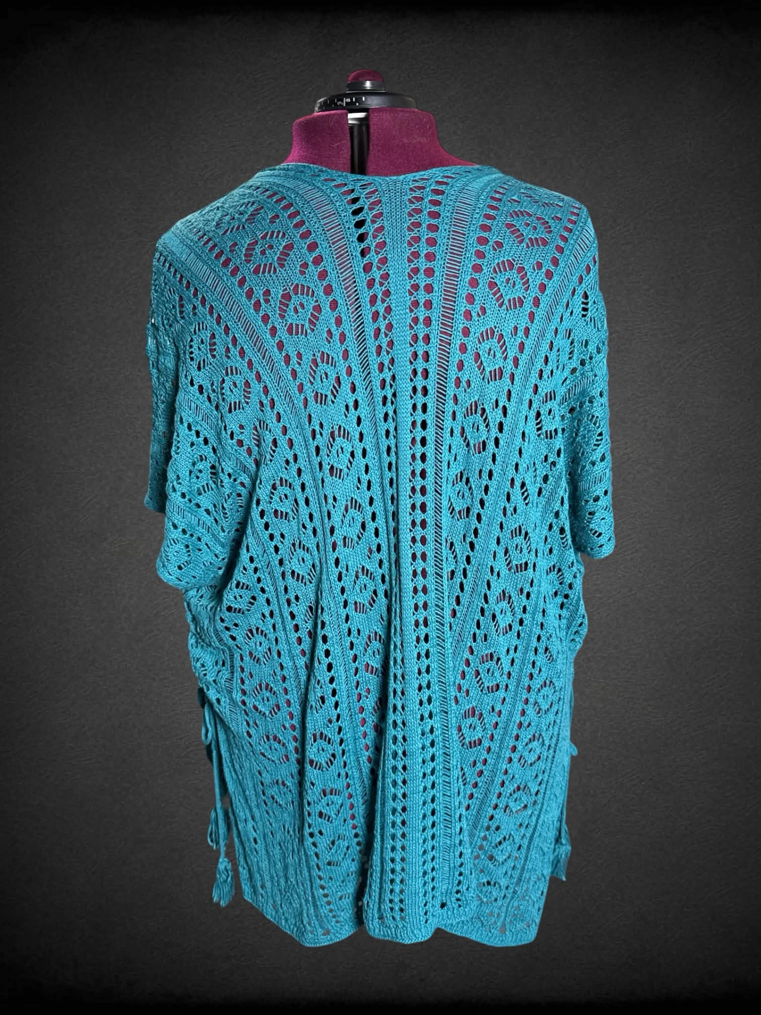 3X teal knit outer layer with tie up sides and tassels