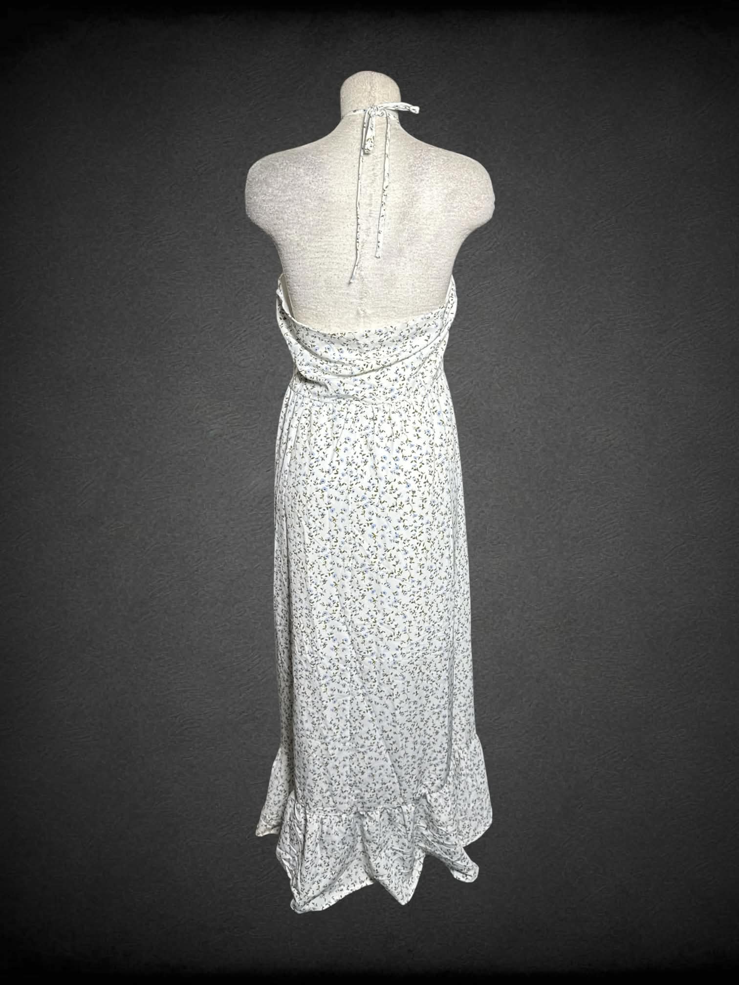 L Blue Rain white high-low dress with halter top, blue floral pattern and zipper on side