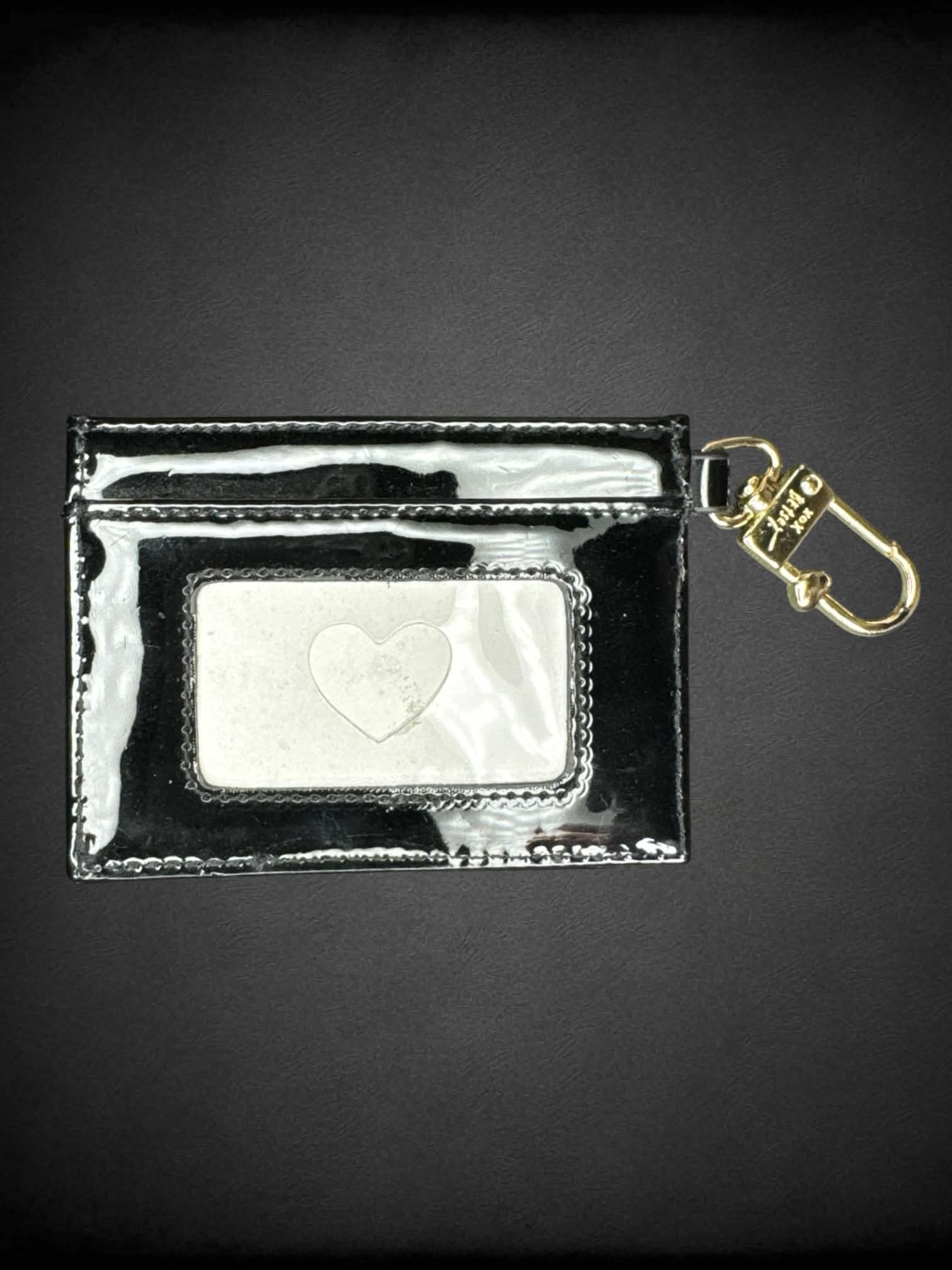 Betsey Johnson black wallet with locket clasp