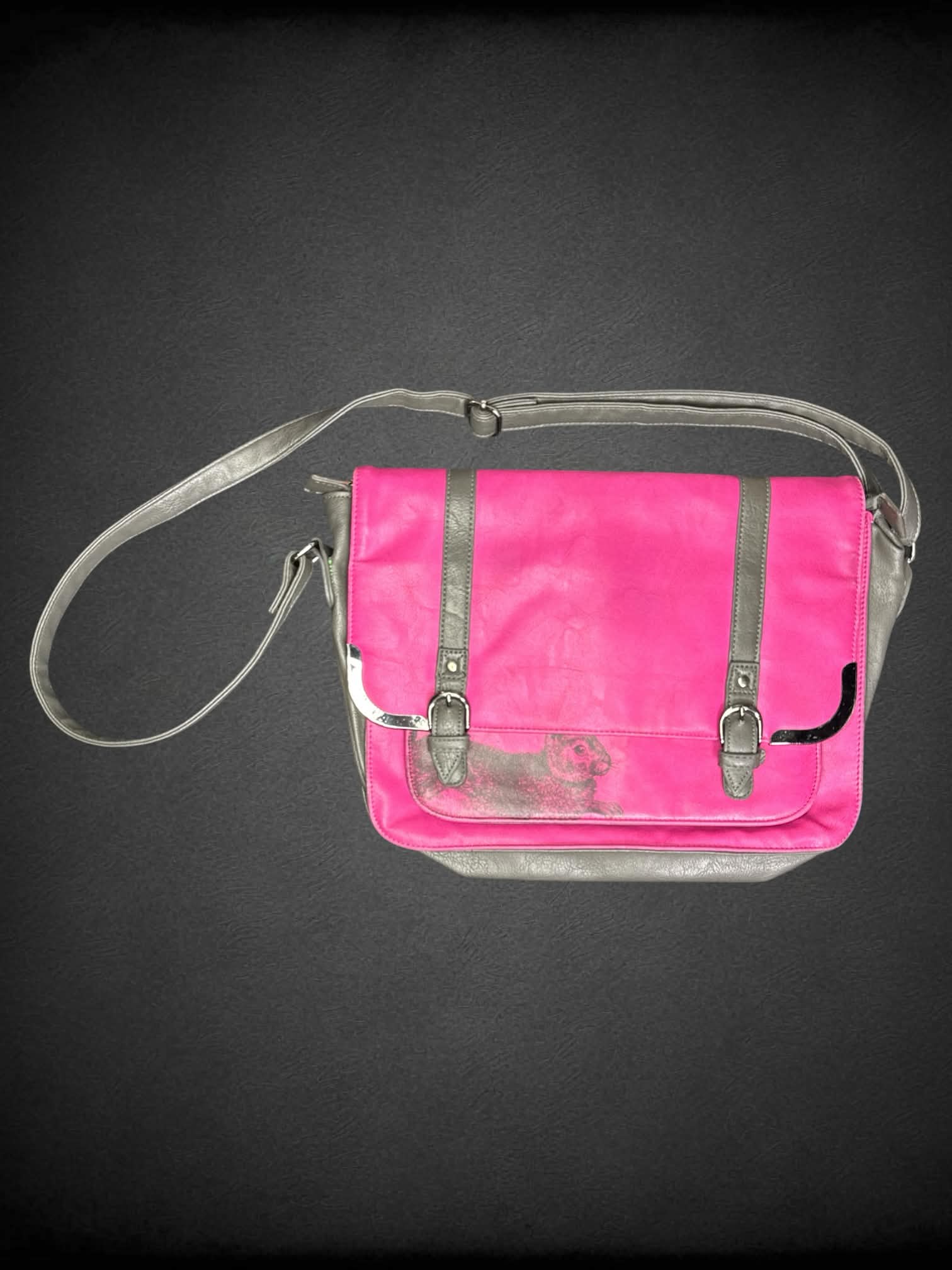 Heritage and Harlequin pink shoulder bag with bunny graphic on front, magnetic snap buttons and zipper pockets