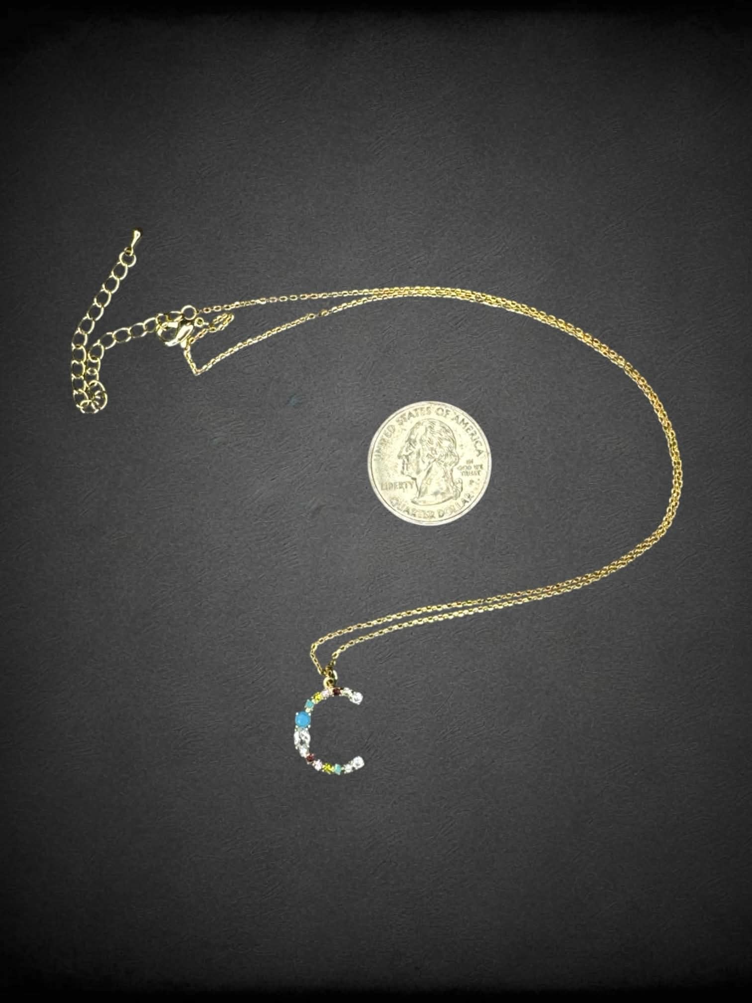 Gold chain necklace with “C” charm