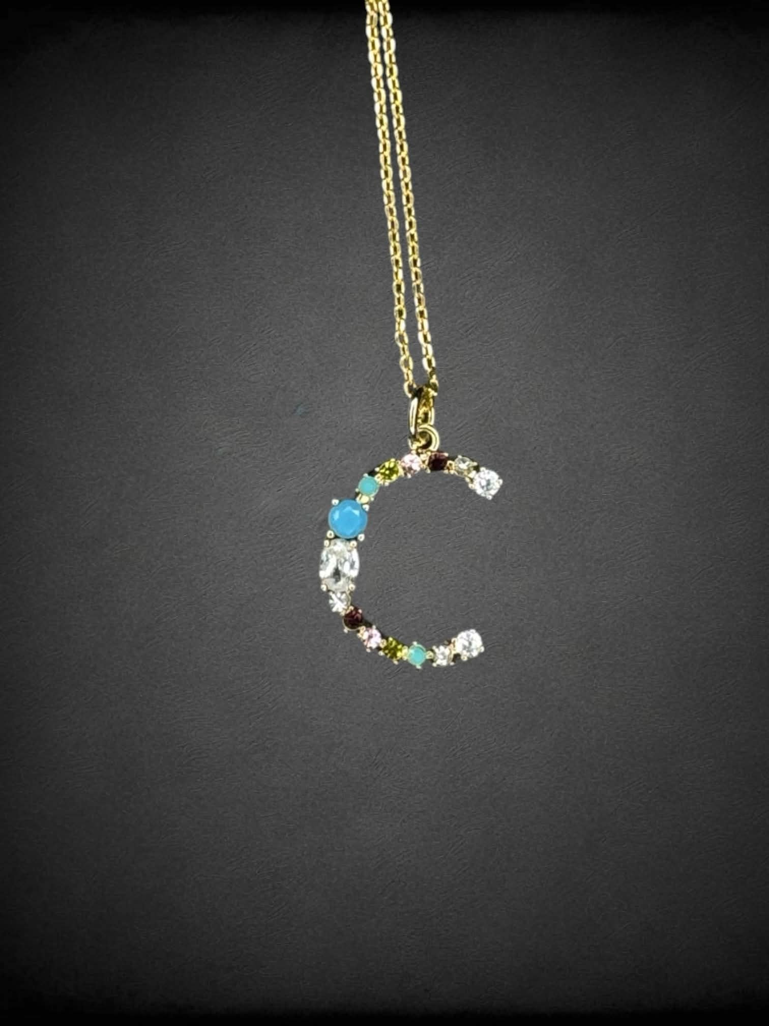 Gold chain necklace with “C” charm