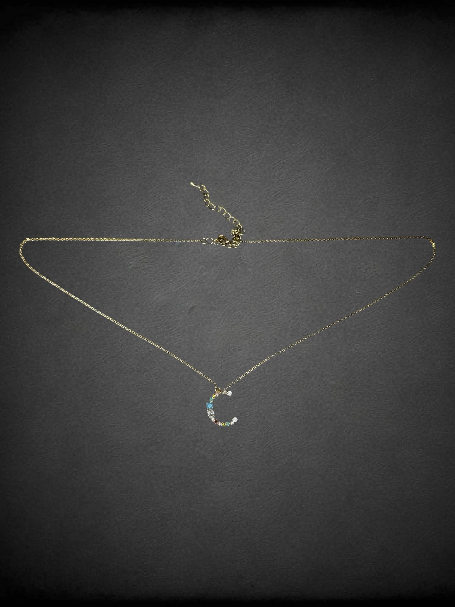 Gold chain necklace with “C” charm