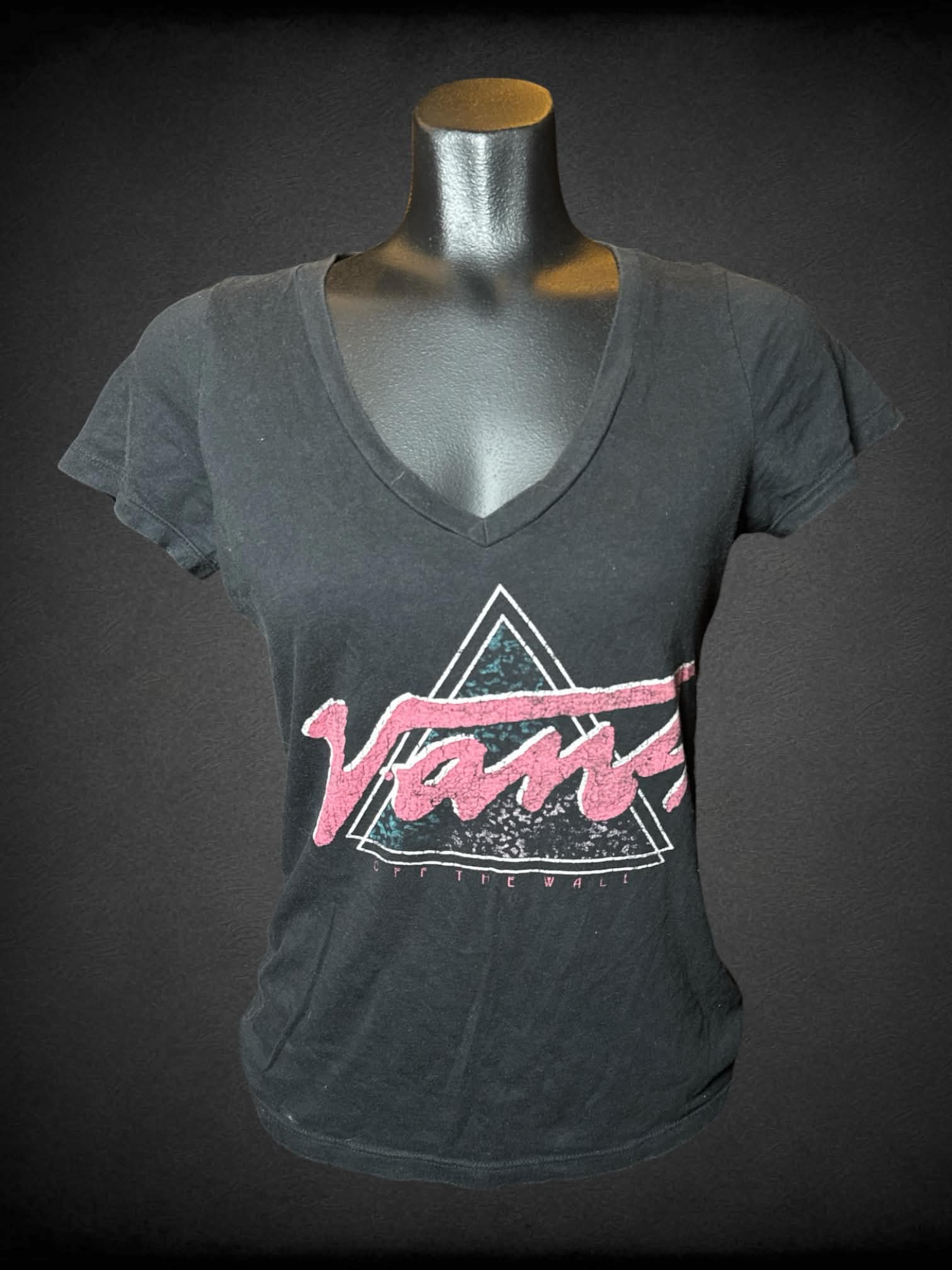 S Vans black v-neck t shirt with pink triangular “Vans” graphic on front