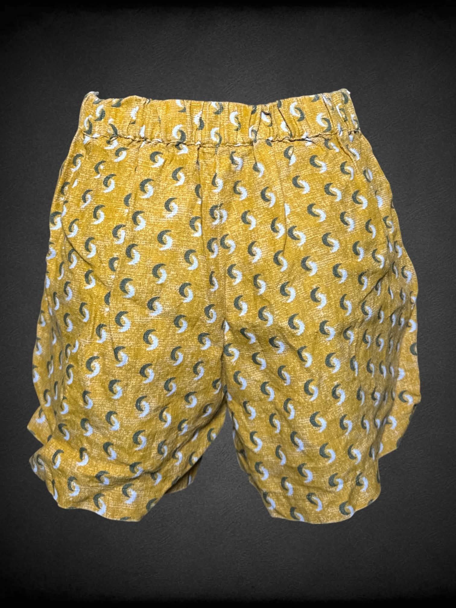 S Vetta yellow linen shorts with moon shaped pattern, and stretch waist