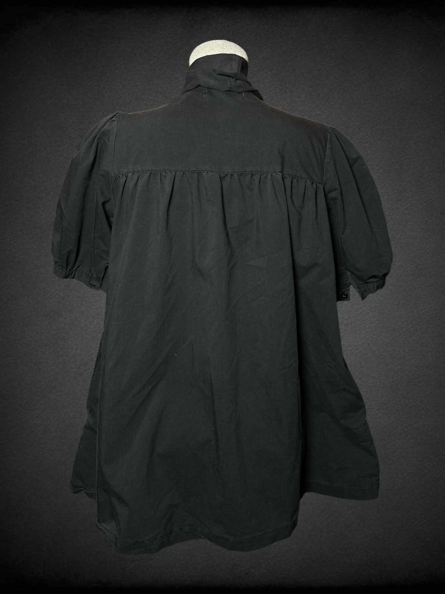 L Bitten black flowy dress with pockets, and tie up neck