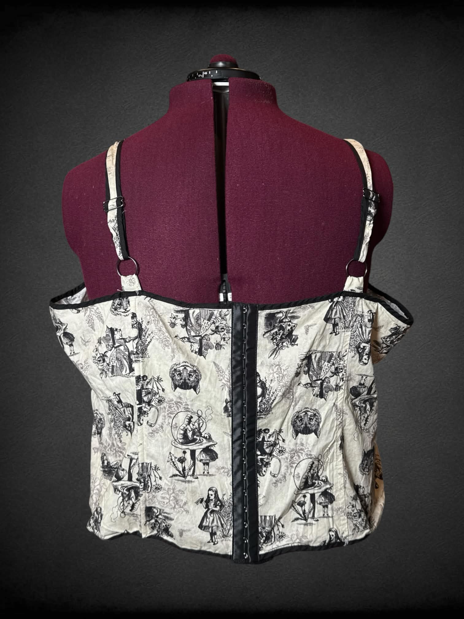 4X Thorn & Fable white corset top with “Alice In Wonderland” illustrative pattern