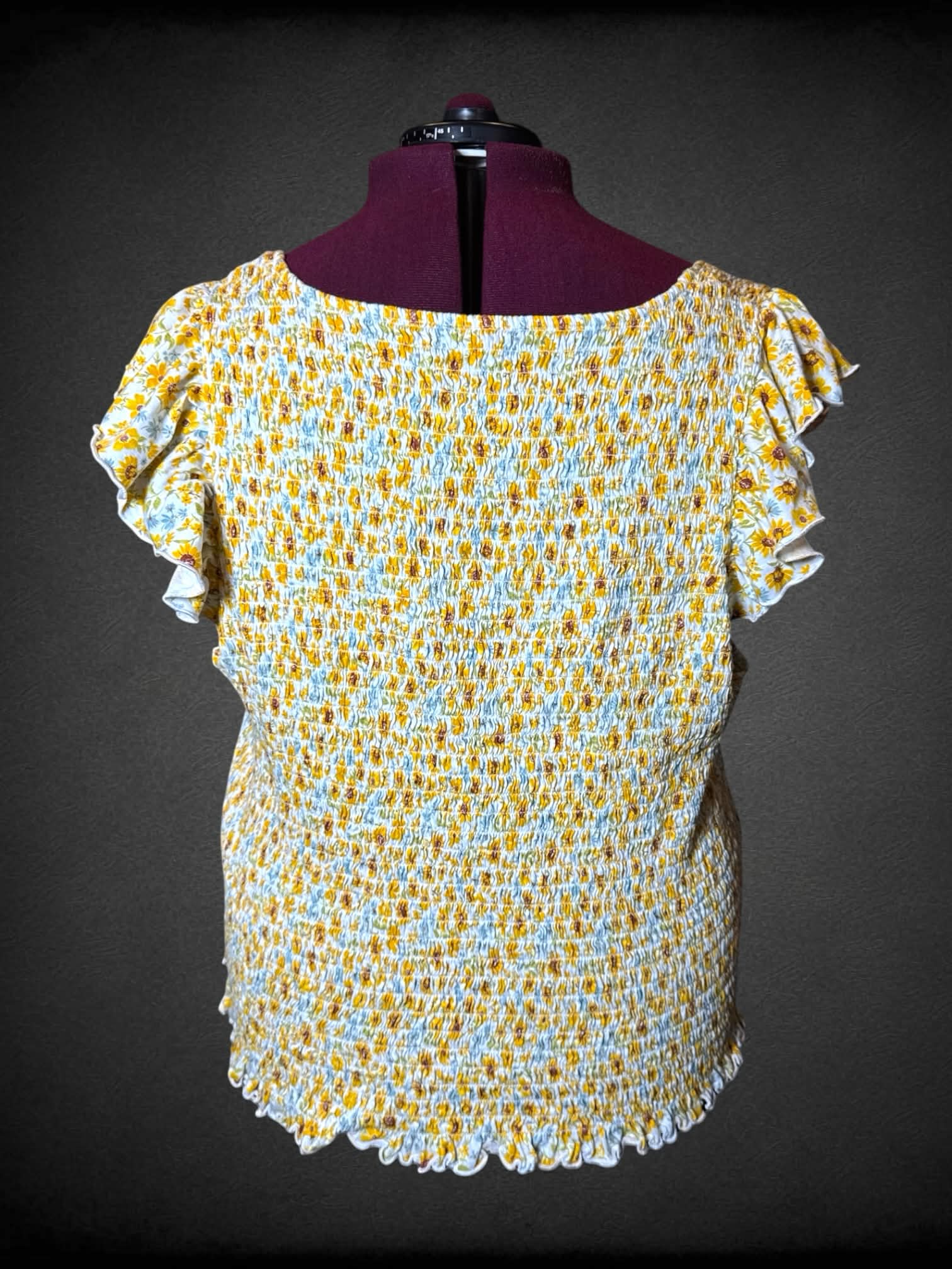 4X Old Navy white shirred top with sunflower pattern, and ruffle trimming