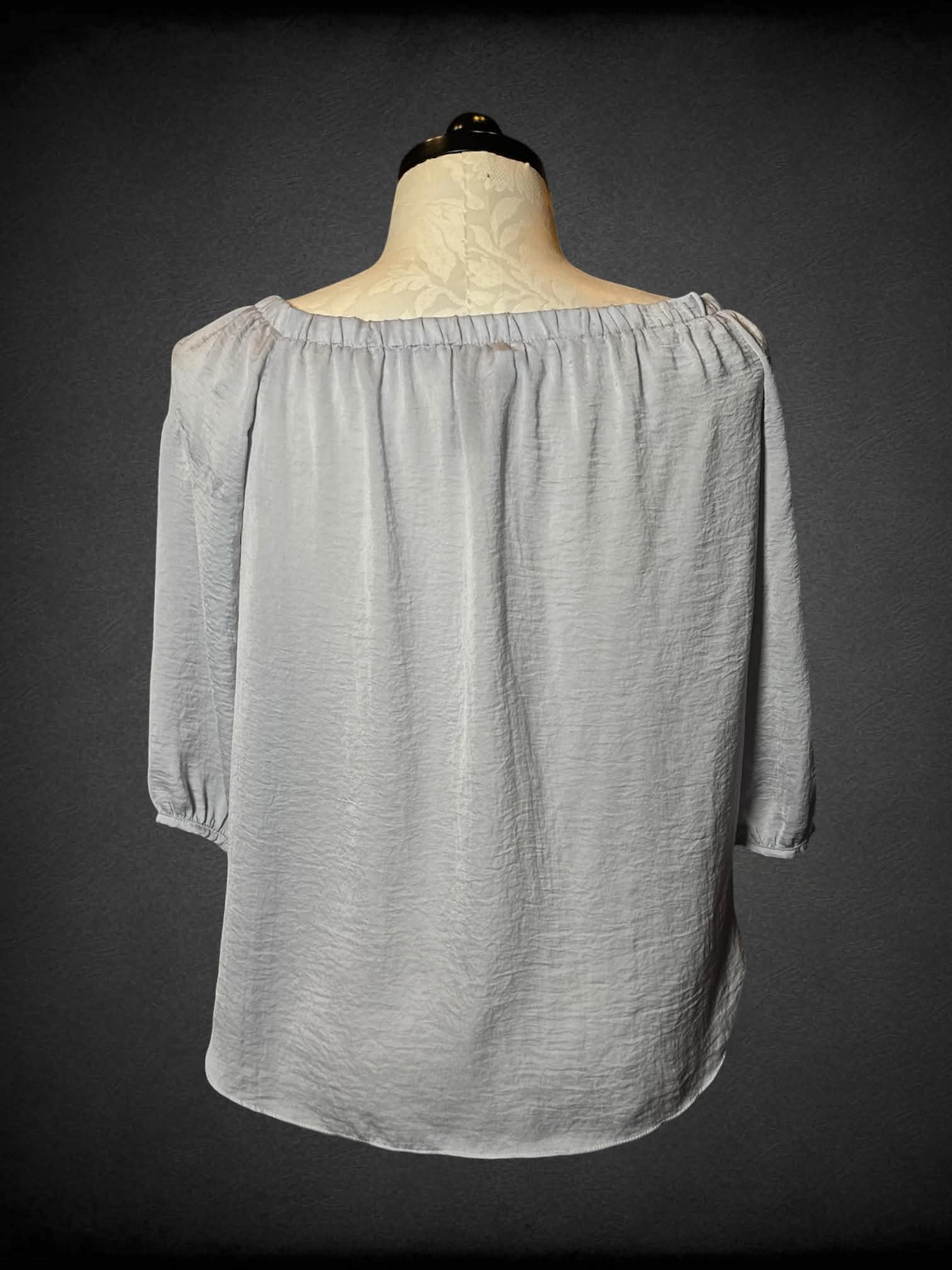 0X Akaa pale blue blouse with cropped tie on front