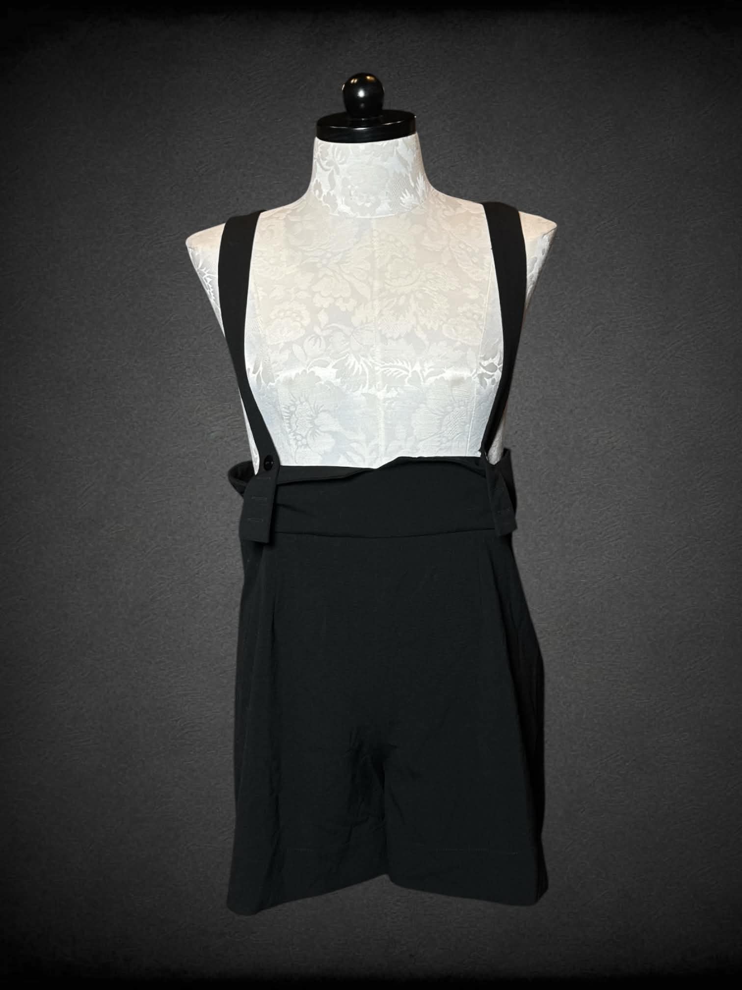0X Black Milk black suspender shorts with adjustable buttons, and zipper on side
