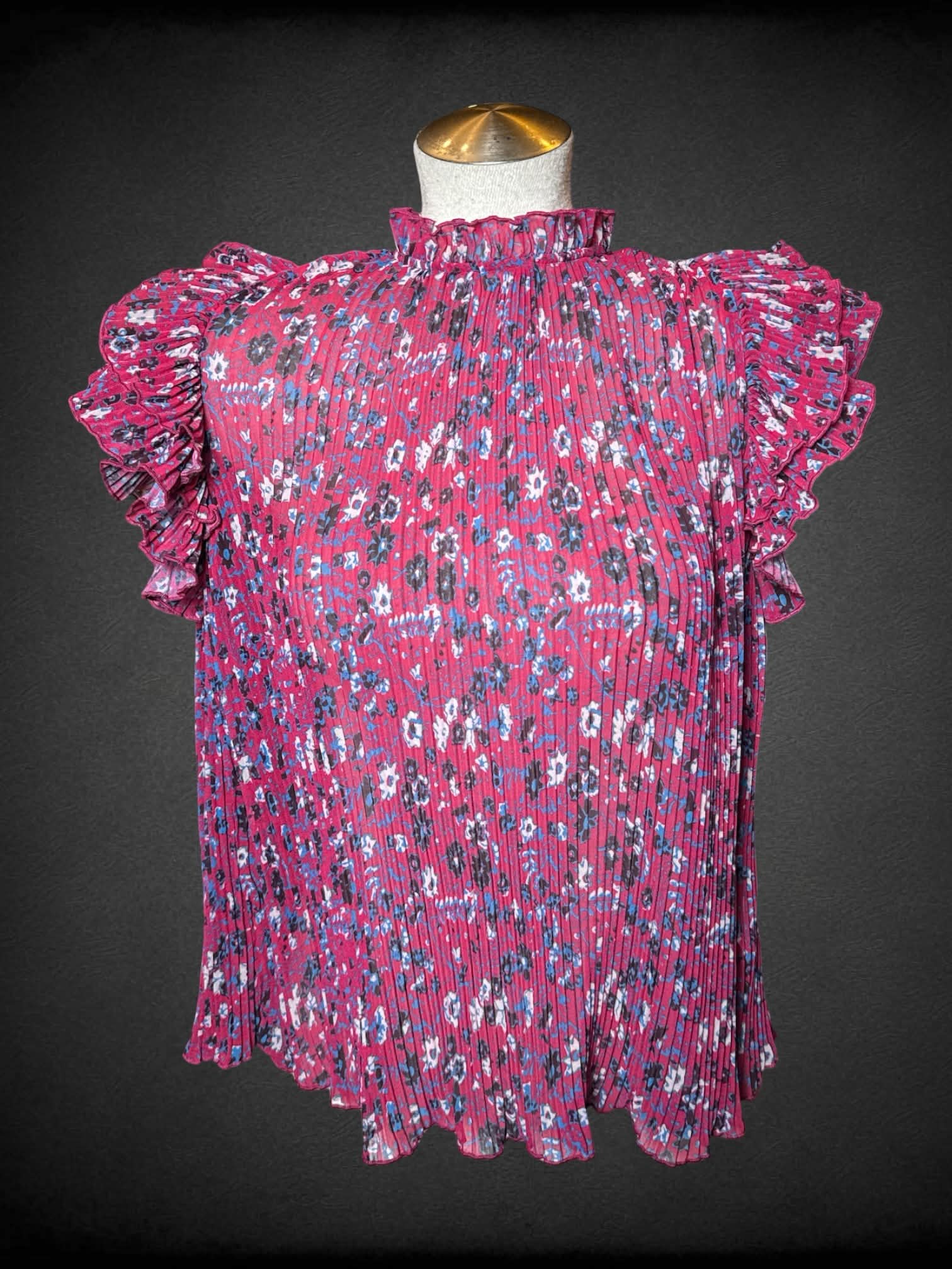 L Anthropologie red sheer pleated blouse with floral pattern, ruffle sleeves, and button on back