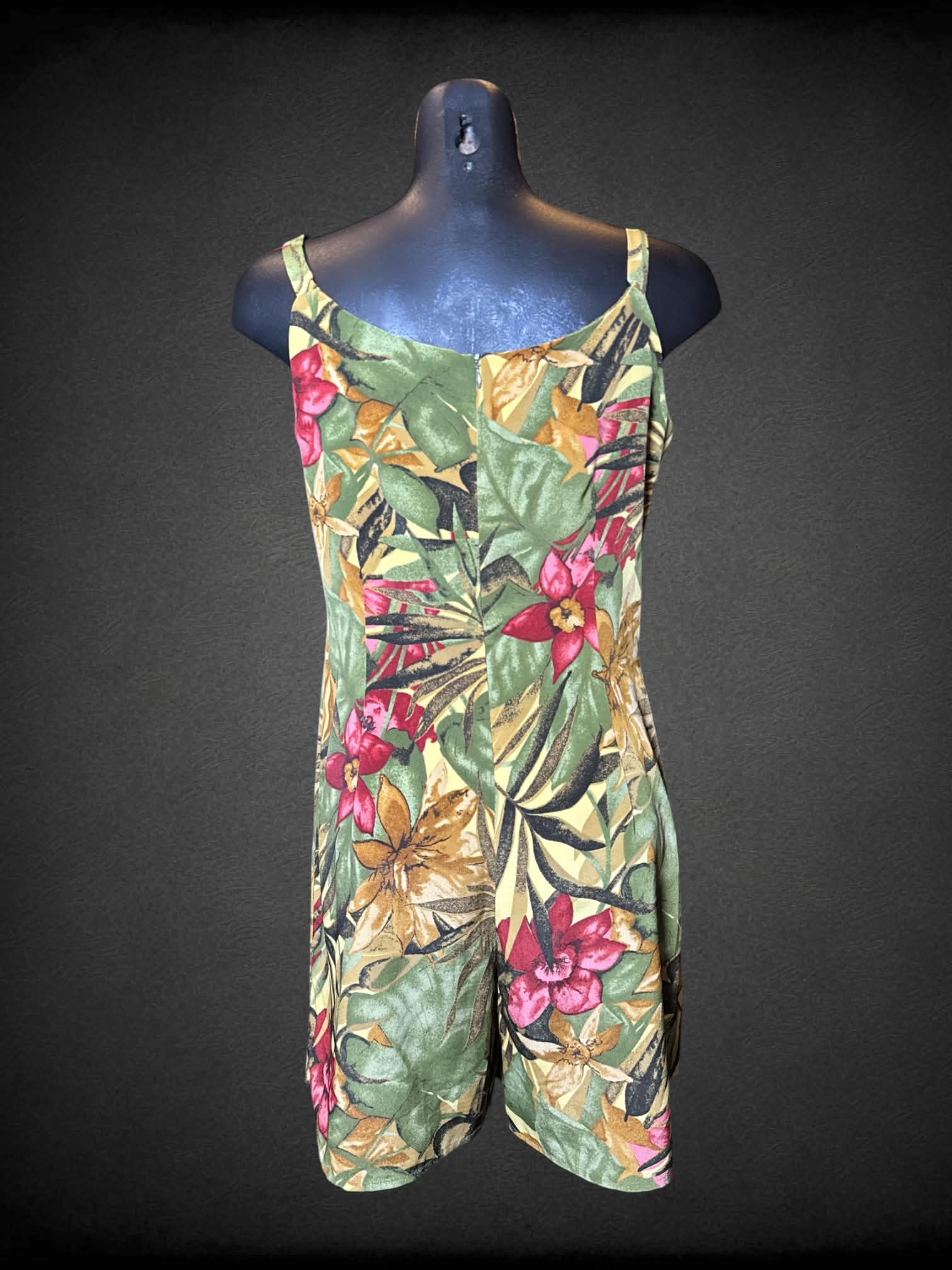 M John Roberts vintage green jumpsuit with floral and leaf pattern, and zipper on back