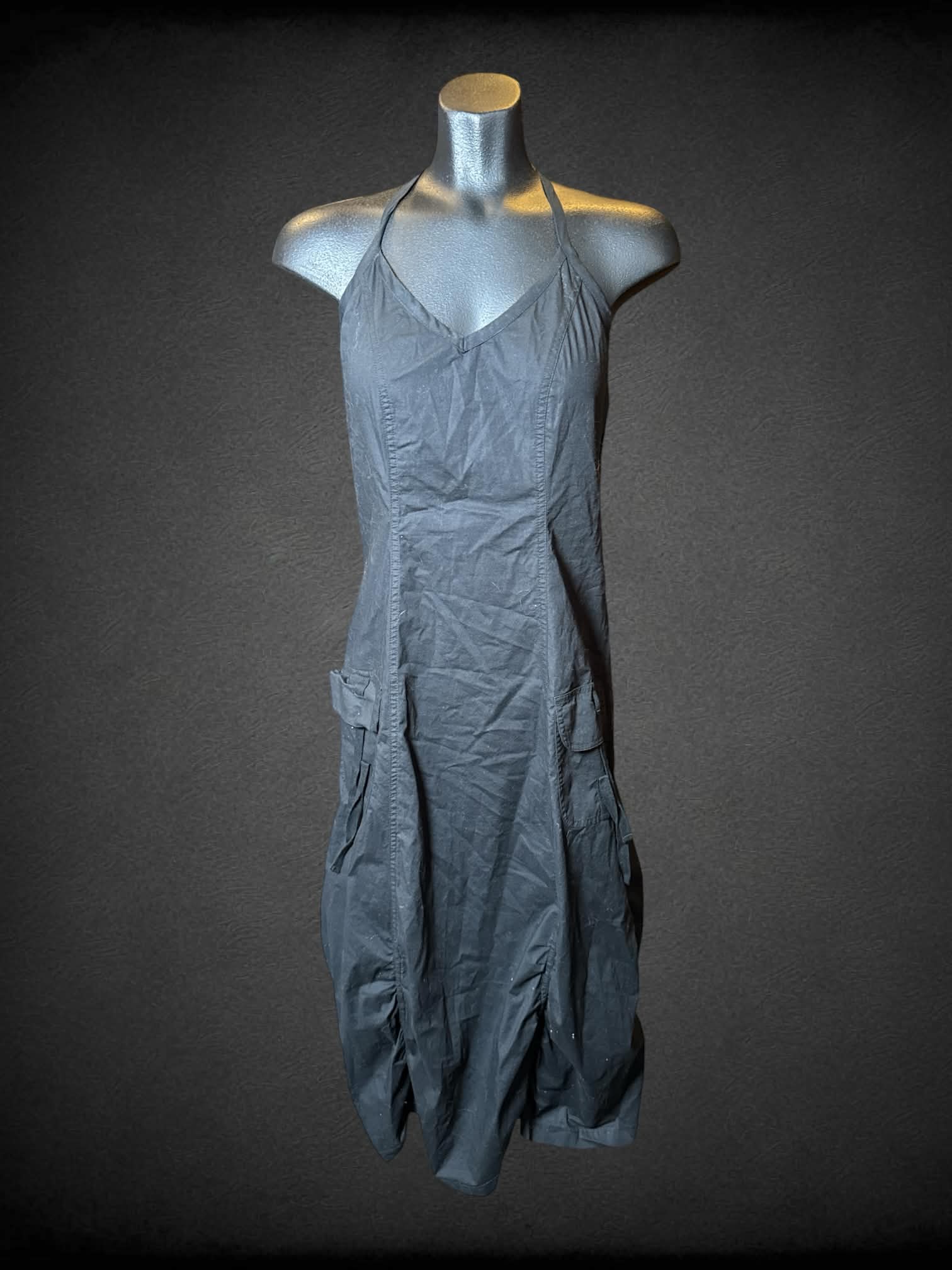 M Contrast black halter dress with cinched hem, pockets, and shirred back