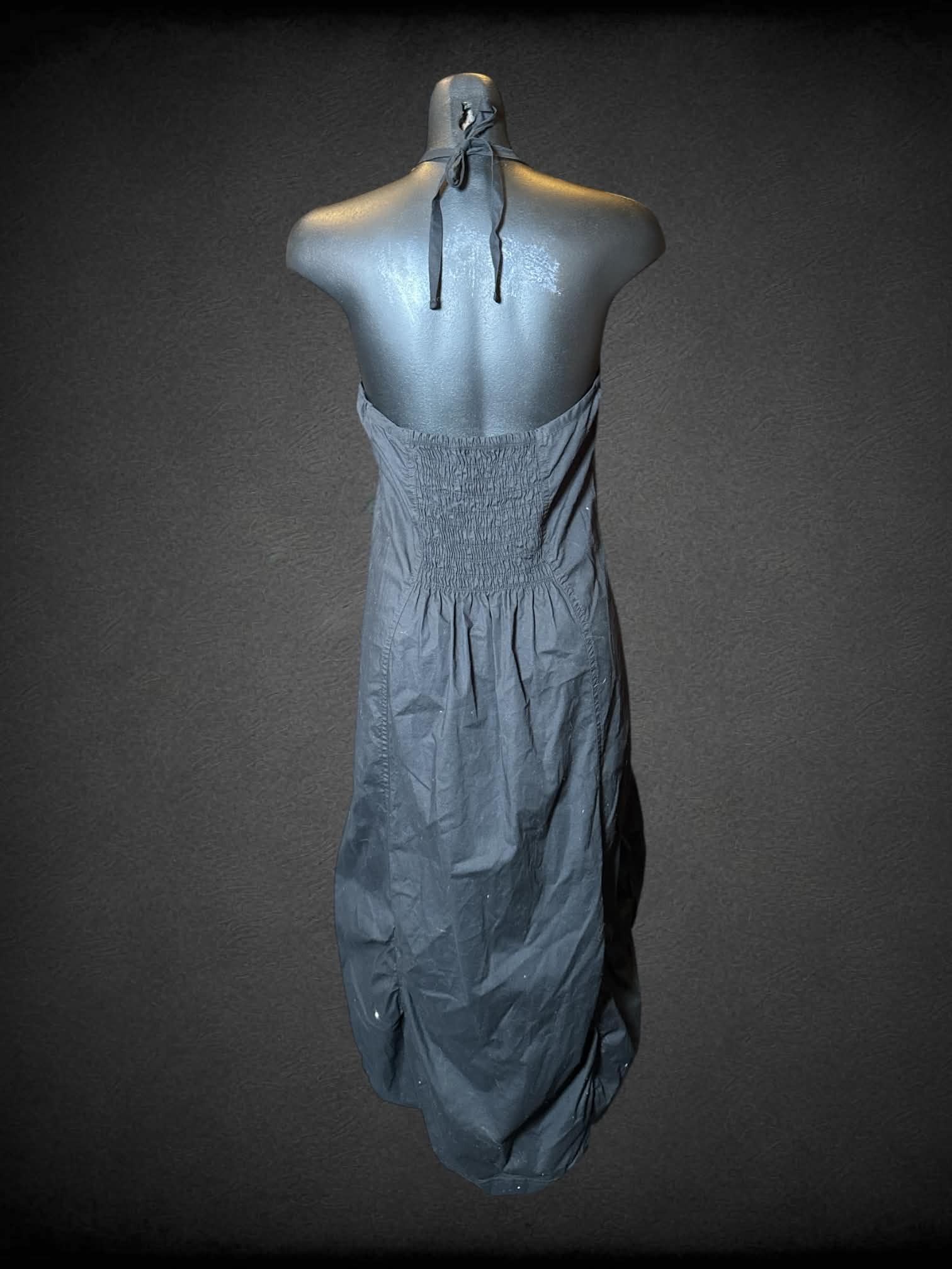 M Contrast black halter dress with cinched hem, pockets, and shirred back