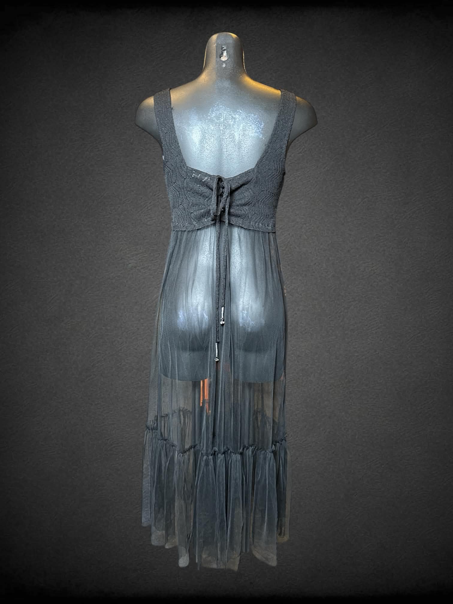 M Free People black sheer dress with woven top, and adjustable tie on back