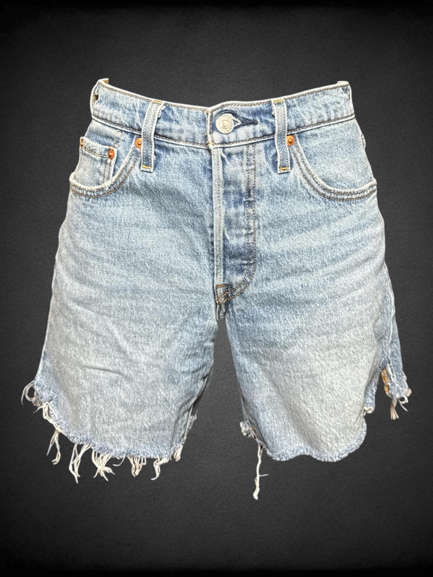 M Levi’s blue denim shorts with distressed hem