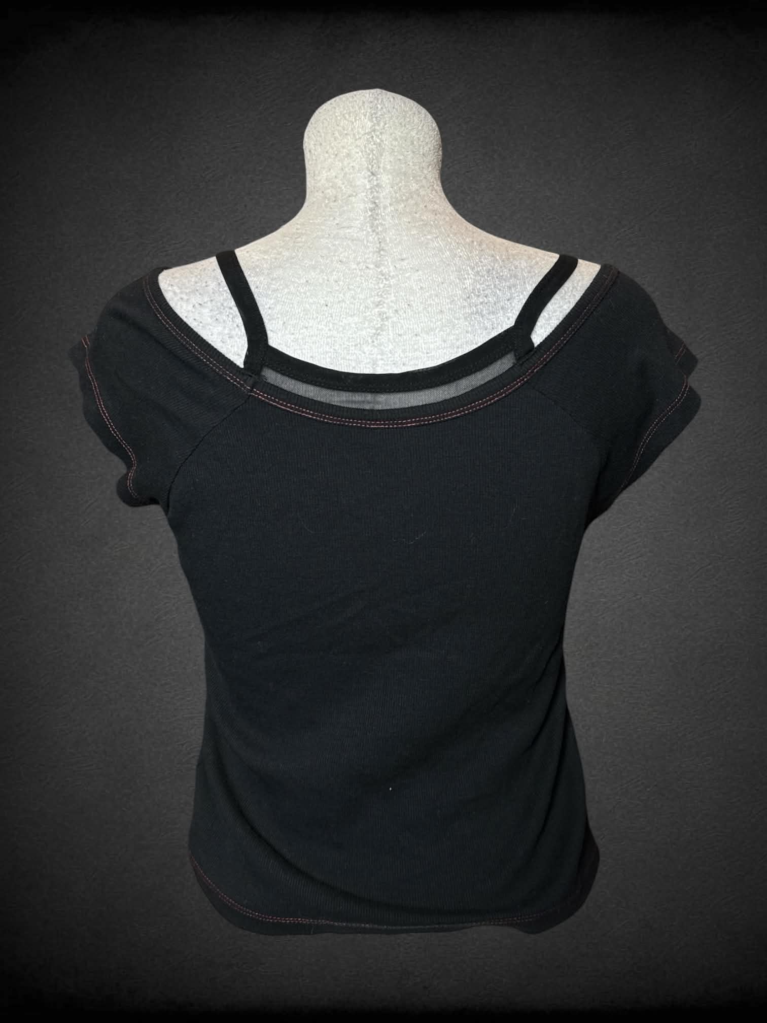 L Vitriole black ribbed baby tee with red tribal heart graphic on front