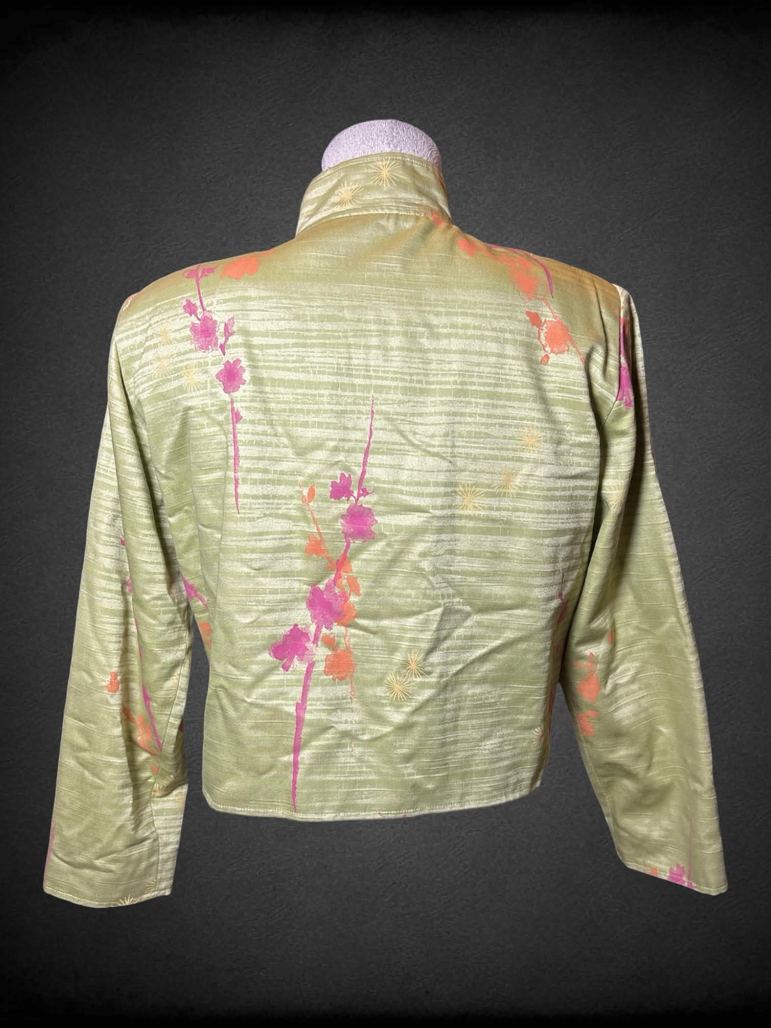 L Painted Pony green button-up jacket with padded shoulders, bamboo buttons, and floral pattern