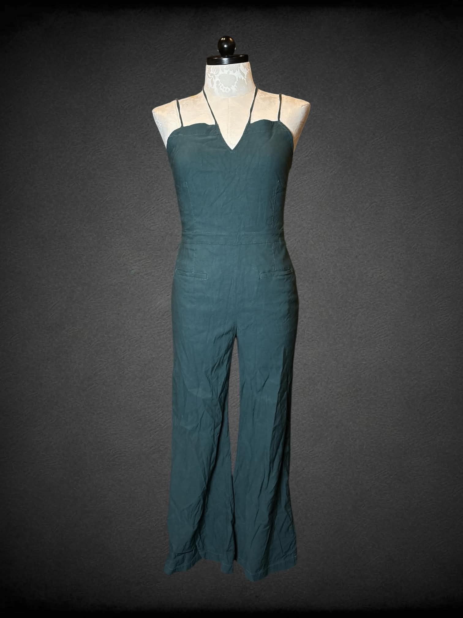 0X Anthropologie green jumpsuit with open lace-up back, and pockets