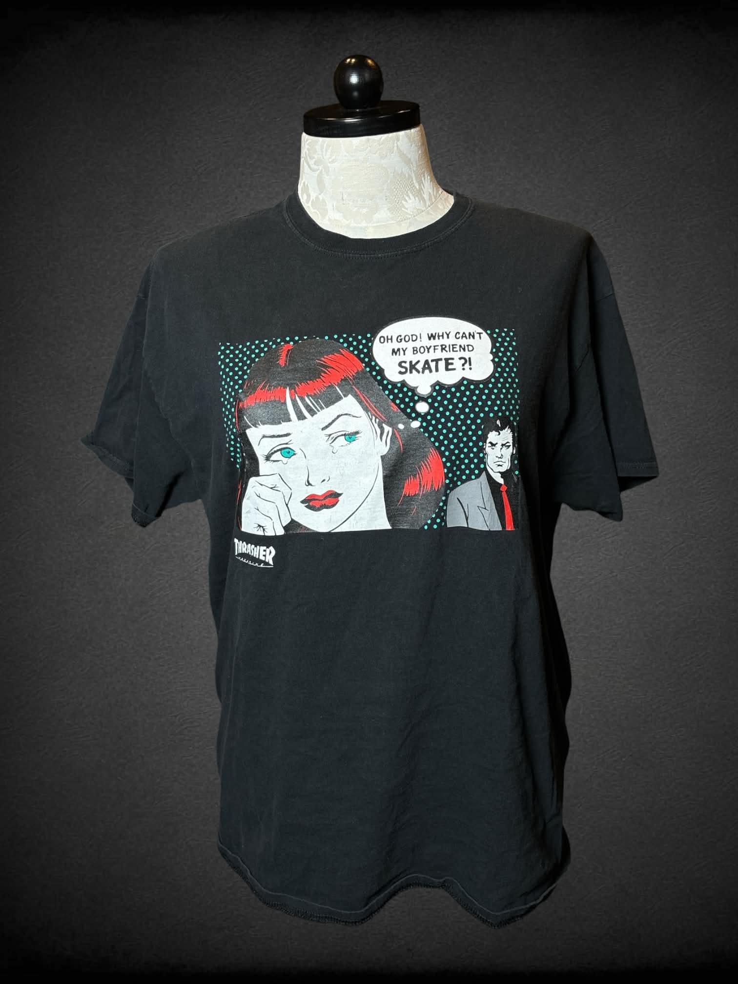 XL Thrasher black t shirt with “Oh God! Why can’t my boyfriend skate?” comic book graphic on front